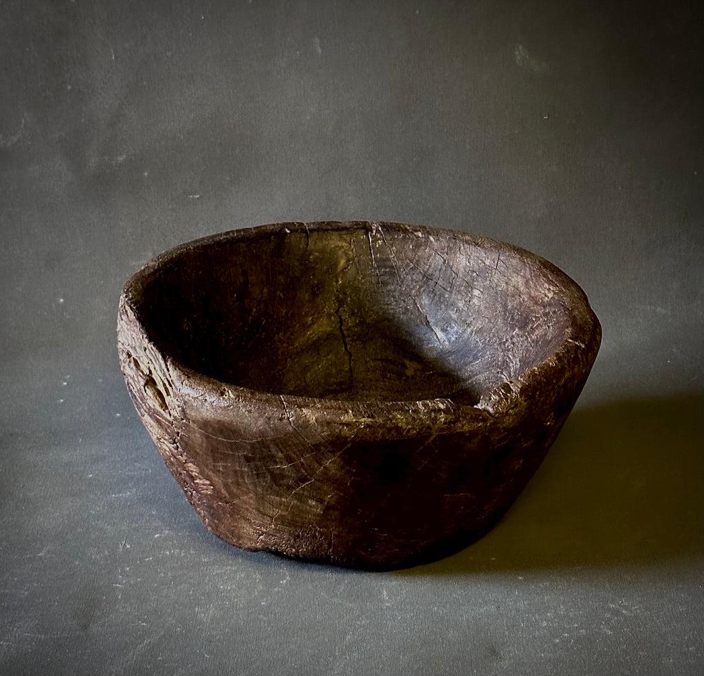 Hand-carved wooden bowl from late nineteenth century Belgium. Rustic and gracious  as a decorative accent, or as a functional vessel for entertaining. 

Belgium, circa 1880

Dimensions: 15W x 14D x 7H
