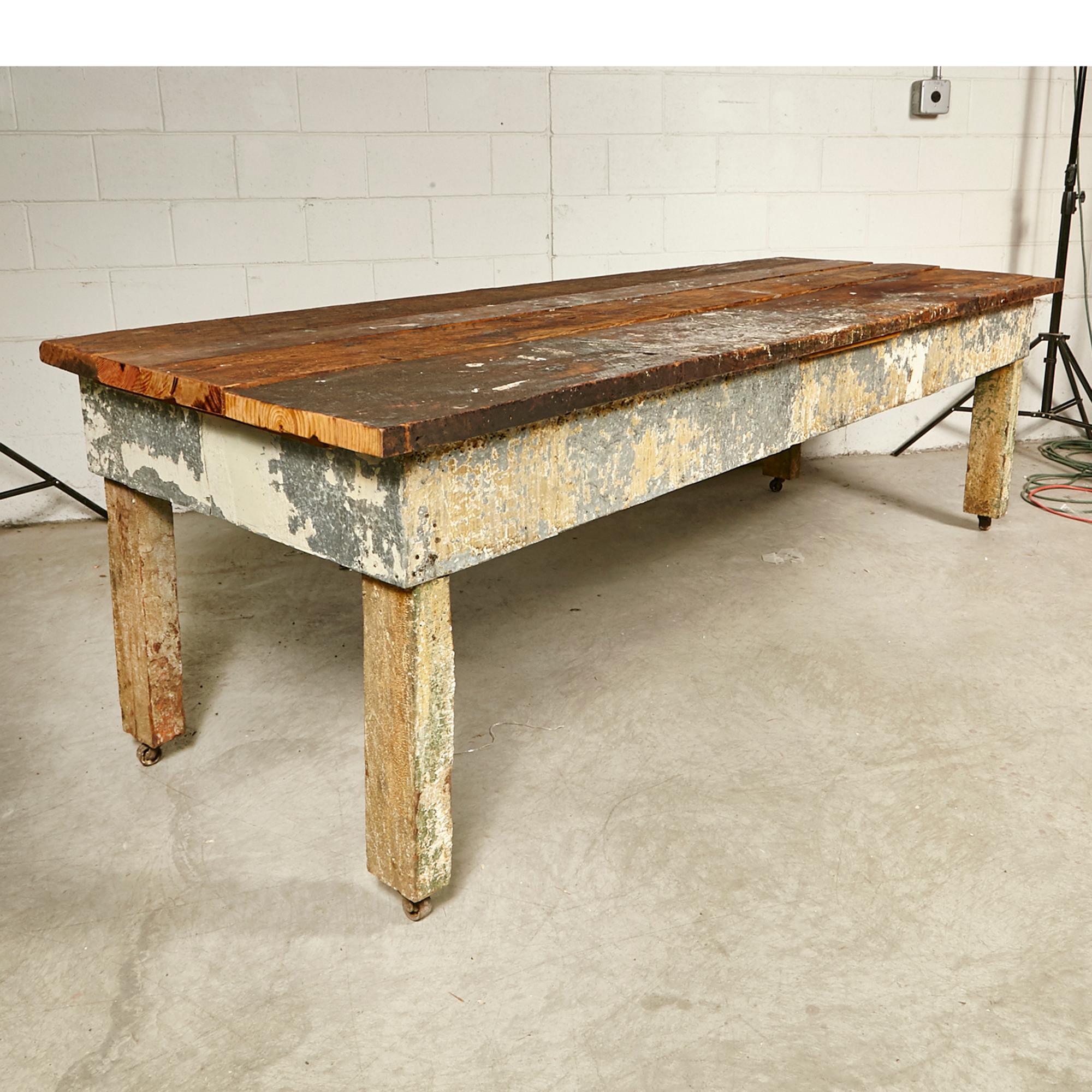 Vintage rustic multi-purpose wood plank top large country table. The table top is removeable with a wash basin and drain underneath. Original paint has been lacquered to retain the paint integrity. Wood blank top is 1.5in. thick. Original rustic