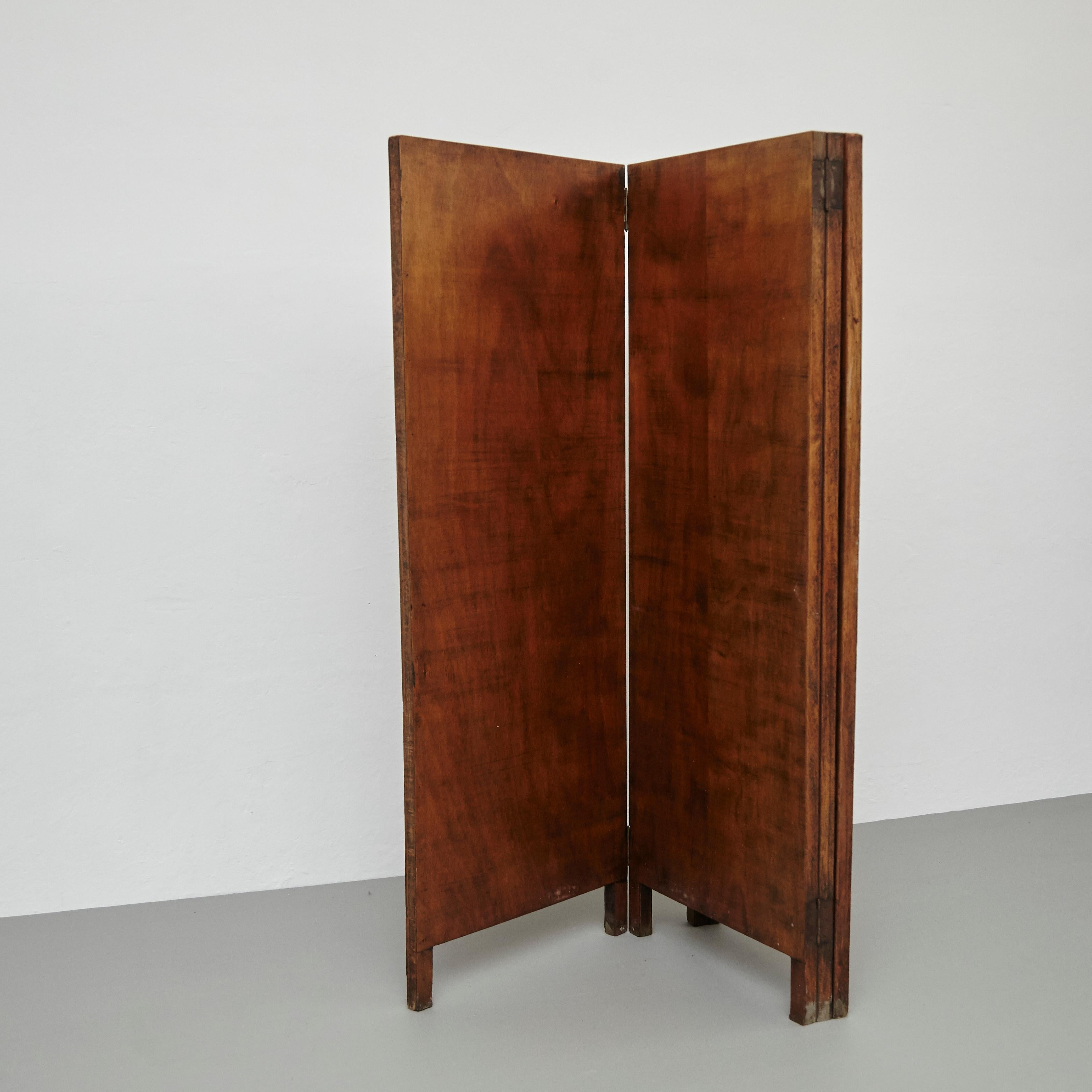 Rustic wood room divider, circa 1930
By unknown artisan, France.

In original condition, with minor wear consistent with age and use, preserving a beautiful patina.

Materials:
Wood

Dimensions:
D 3 cm x W 58 cm (each panel) x H 160 cm
D 3