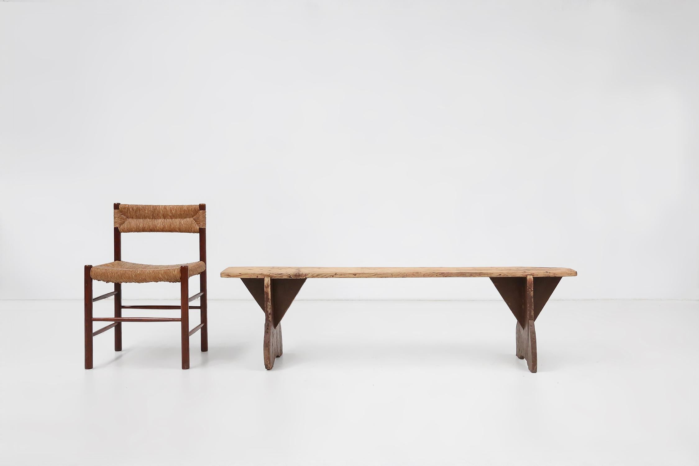France / 1890 / bench / wood / rustic / mid-century / French provincial

A rustic mid-century wooden bench with brown painted feet and natural top. With beautiful patina due to age. Made in France around 1890. We can offer 2 benches of the same