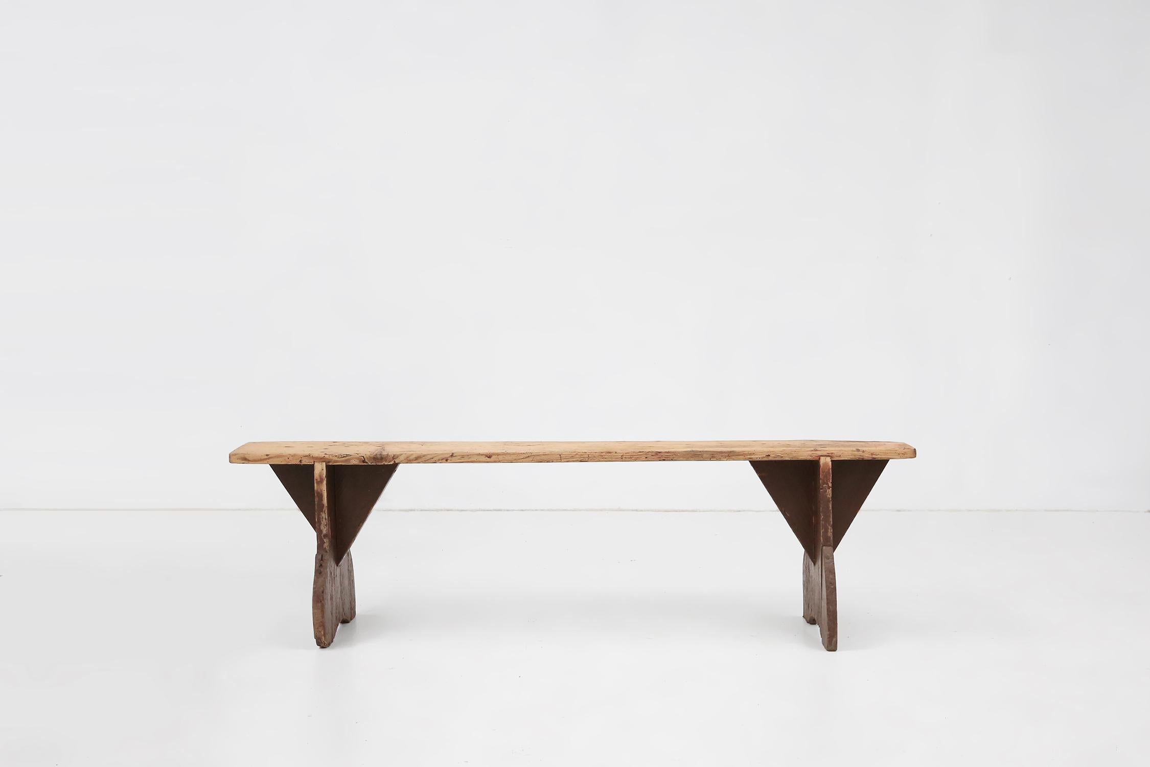 Rustic wooden bench in with brown painted feet, France ca. 1890 For Sale 2
