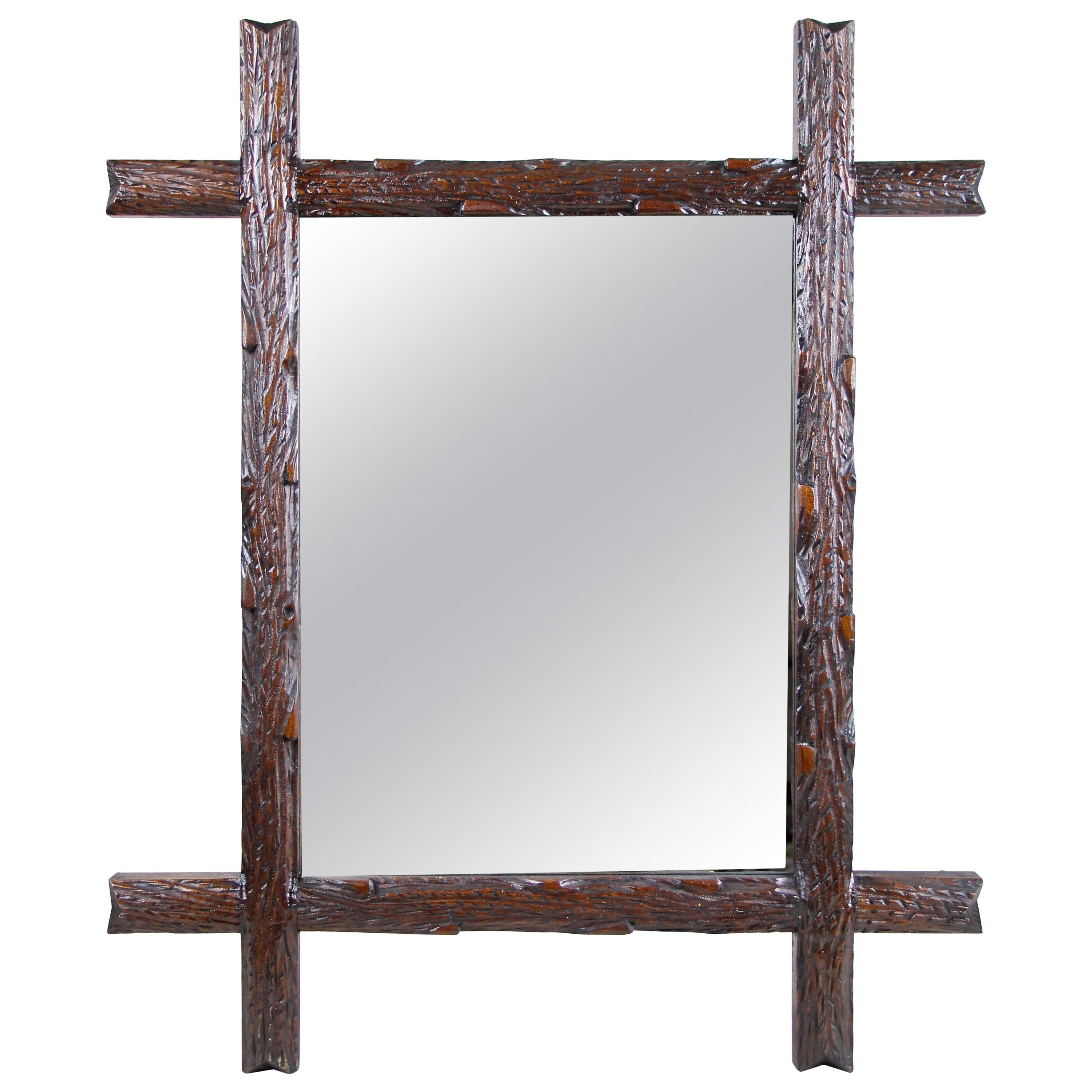 Black Forest Wall Mirror Hand Carved Rustic Design, Austria, circa 1880 For Sale