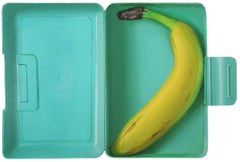 Banana in green lunchbox-  21st Century Contemporary Modern Still-life Painting