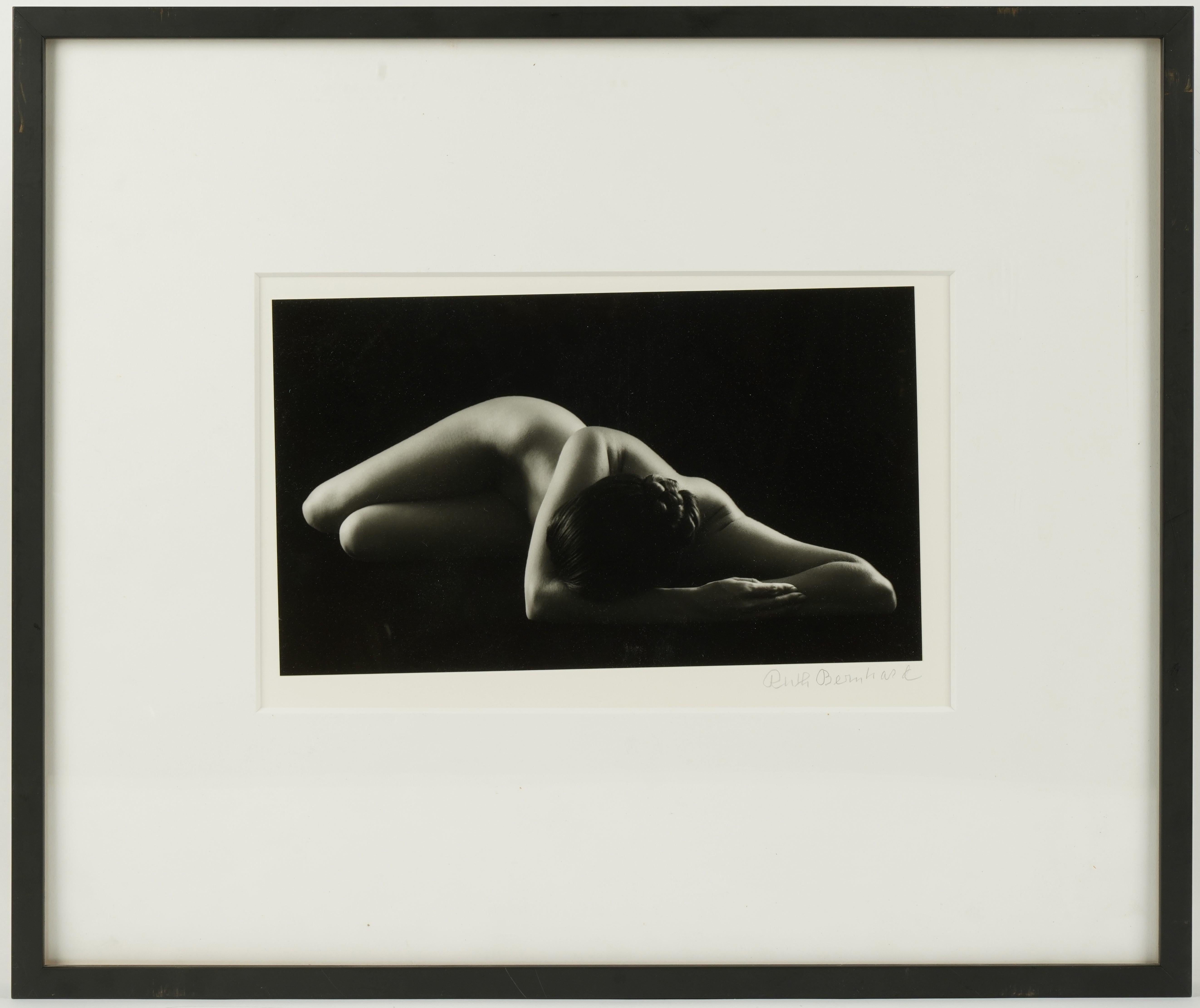 A beautiful and timeless image/photographic print by famed German-American photographer/artist Ruth Bernhard (1905-2006). This classic feminine nude study is titled 