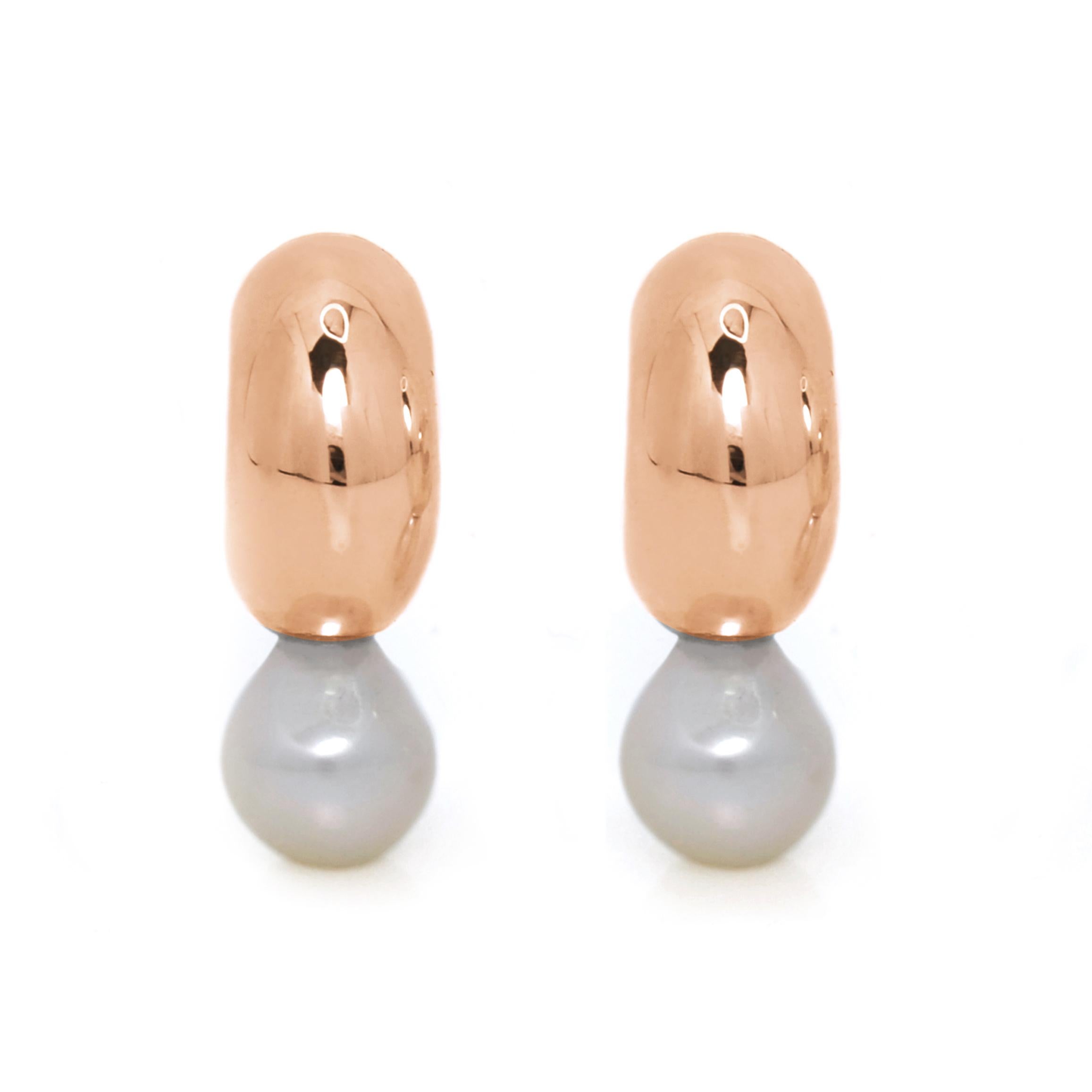 The Melu Huggies, fresh water pearl hoop earrings featuring tear drop pearls in a design that calls to mind the mysterious and mystical sirens of folklore.

Meticulously handcrafted from sterling silver. Pearls may vary slightly in shape and luster