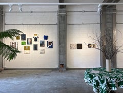 Art and fashion, black dark brown shirt with blue pleats and texture