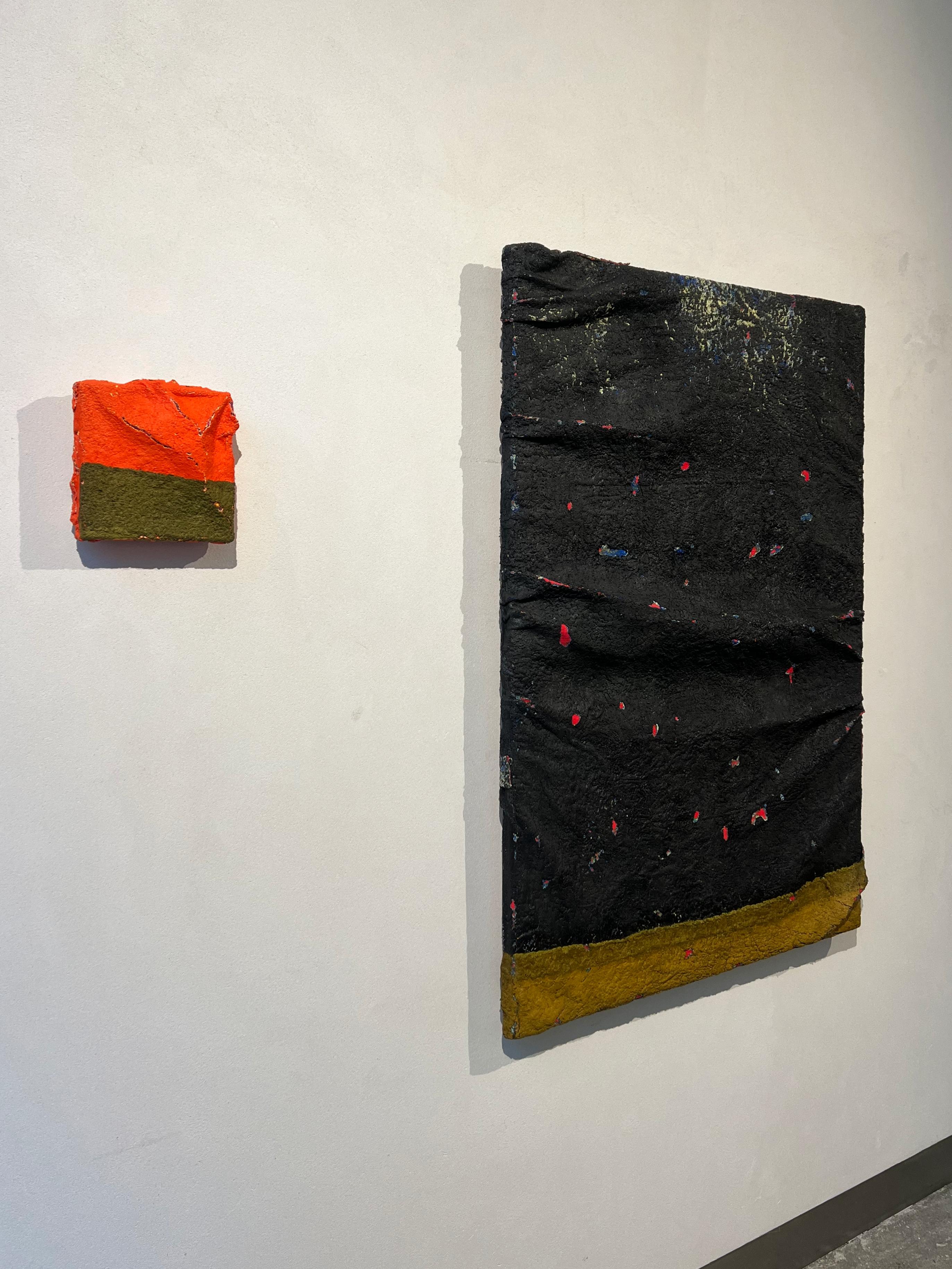 Large inflatable painting, layers and folds on canvas, black, details yellow red - Black Abstract Painting by Ruth Vidal