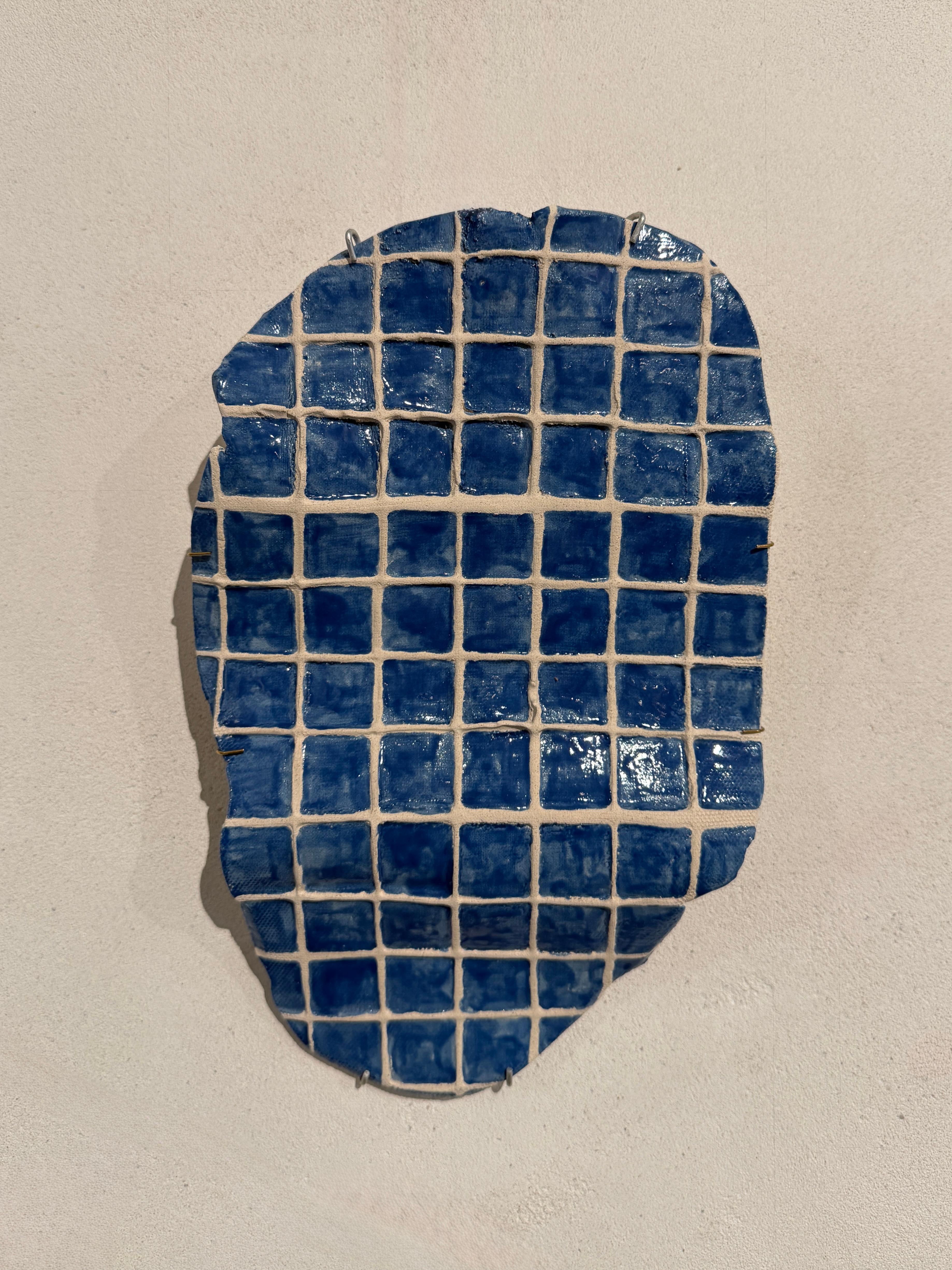 Ruth Vidal Figurative Sculpture - Designer plate for hanging on the wall, handmade ceramic, natural blue pigment