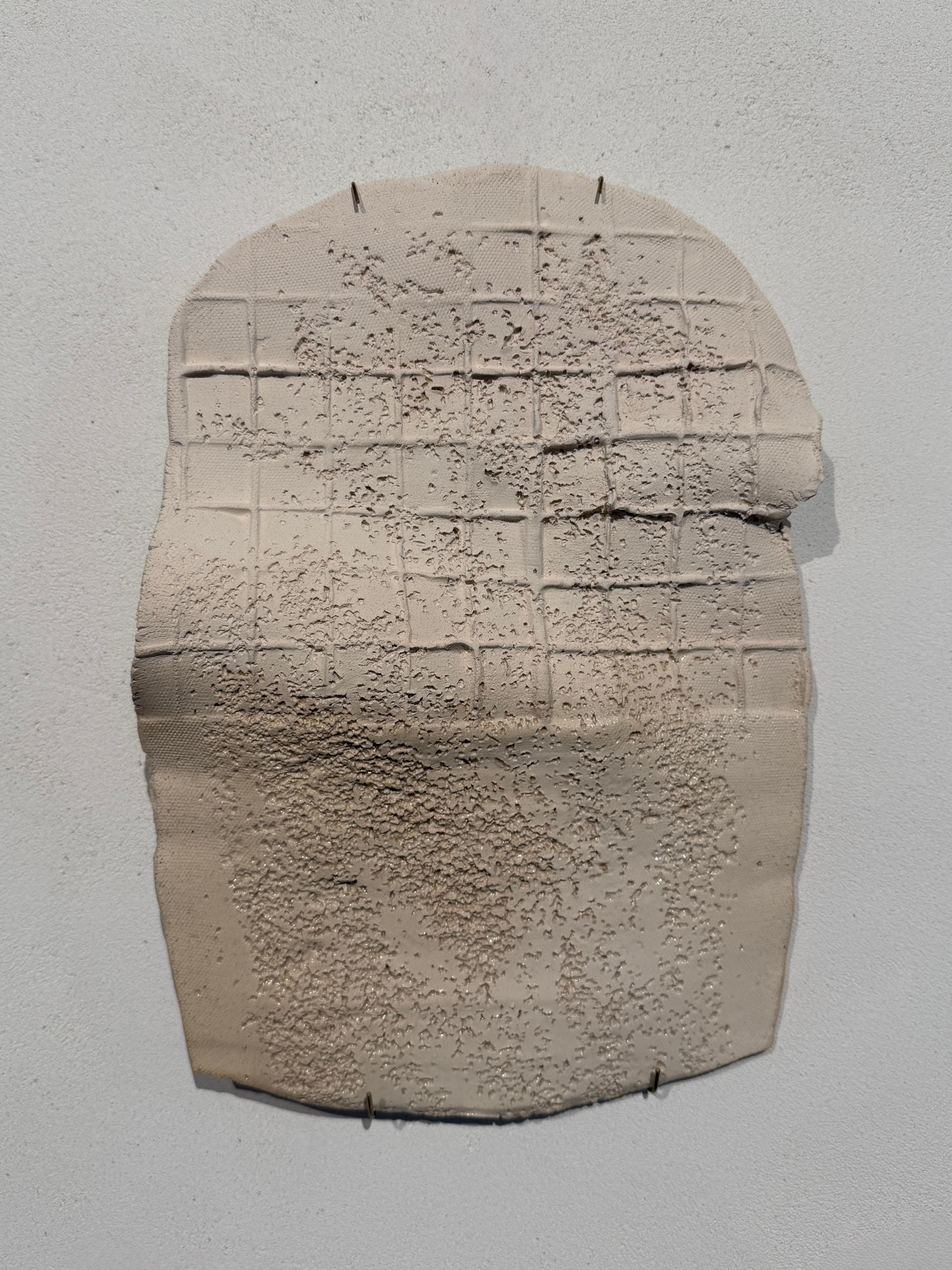Unique wall piece made of ceramic, glazed with a special finish, off white