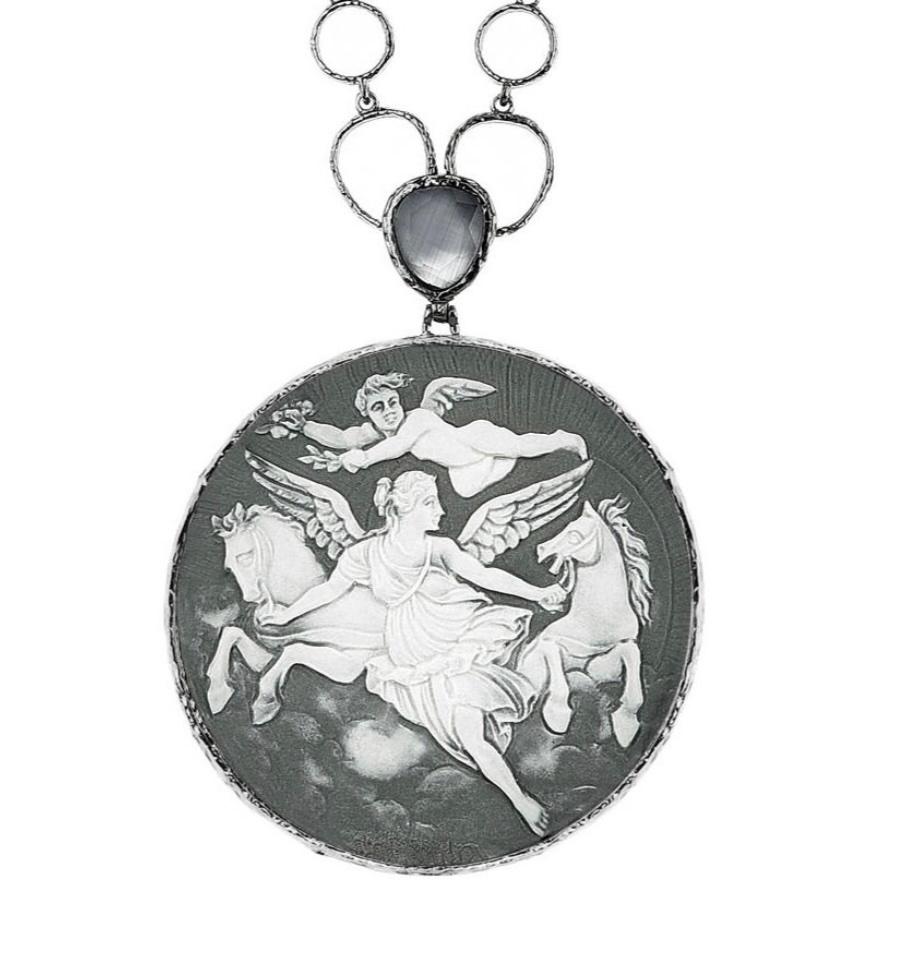 Ruthenium Finish Sterling Silver and Fine Porcelain
Handmade in Italy

Finely detailed porcelain cameo depicting a scene with guardian angel and cherub. Bold and elegant, this is the ideal statement piece to include in your jewellery collection.