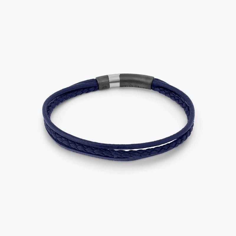 Ruthenium Plated Sterling Silver Gear Click Bracelet with Brown Leather, Size S

This bracelet combines two blue toned leather to create a classic style for an effortless layered bracelet look. We have paired these with our new click clasp, made by