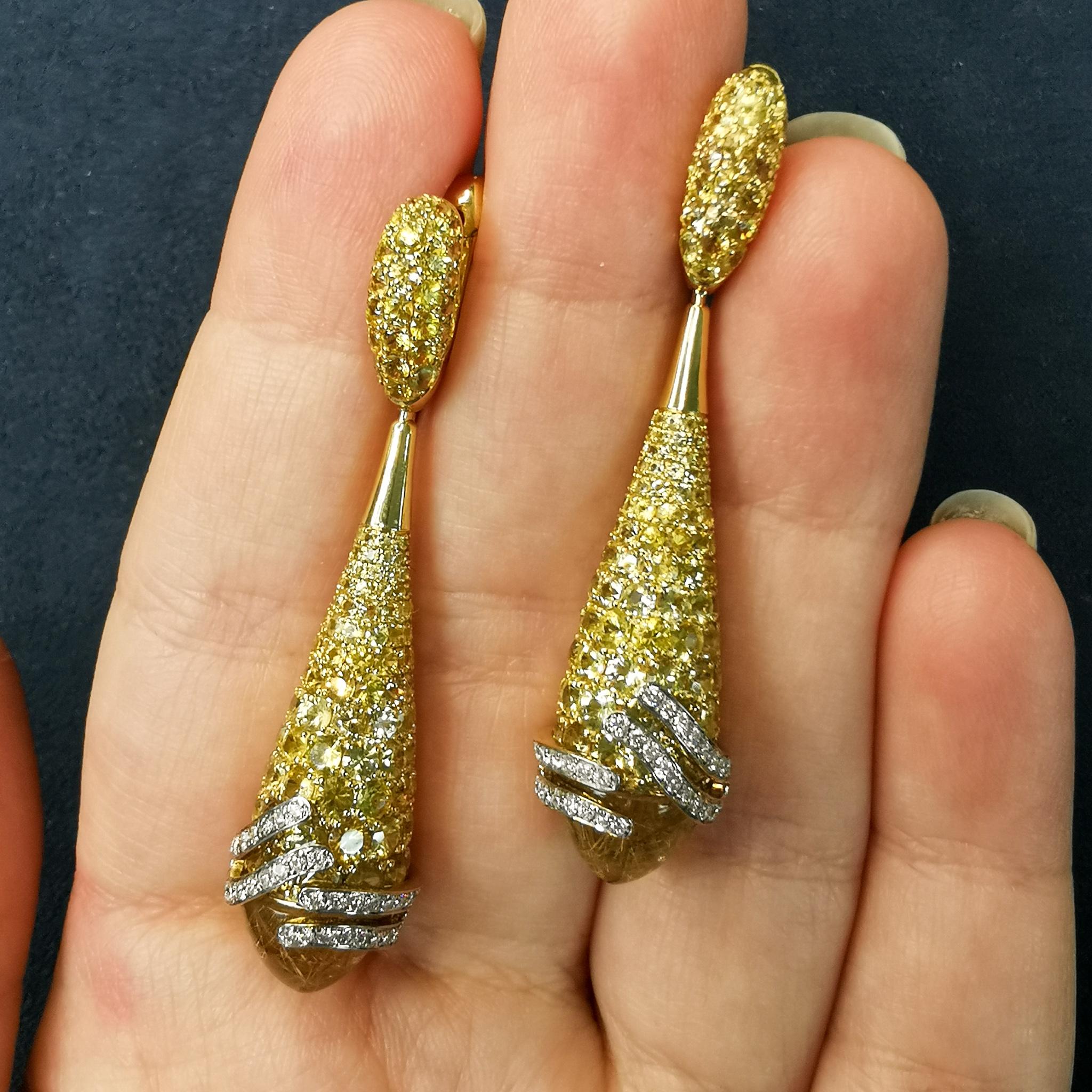 Rutilated Quartz 7.54 Carat Sapphire Diamonds 18 Karat Yellow Gold Fuji Earrings
Series of these Earrings isn't called Fuji for nothing, since the inspiration for the creation of these products came to us exactly from the contemplation of this