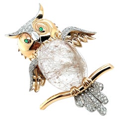 Broche de Cuarzo Rutilado con Diamantes en Oro Rojo y Blanco de 18 Kilates