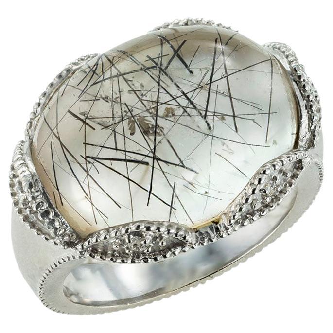 Bague en or blanc avec quartz rutile et diamants en vente