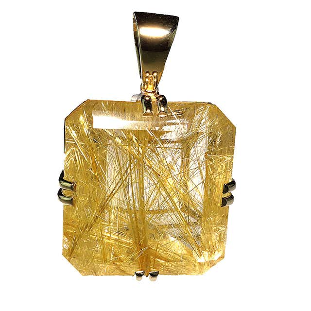 Golden rutilated quartz pendant Clearance
