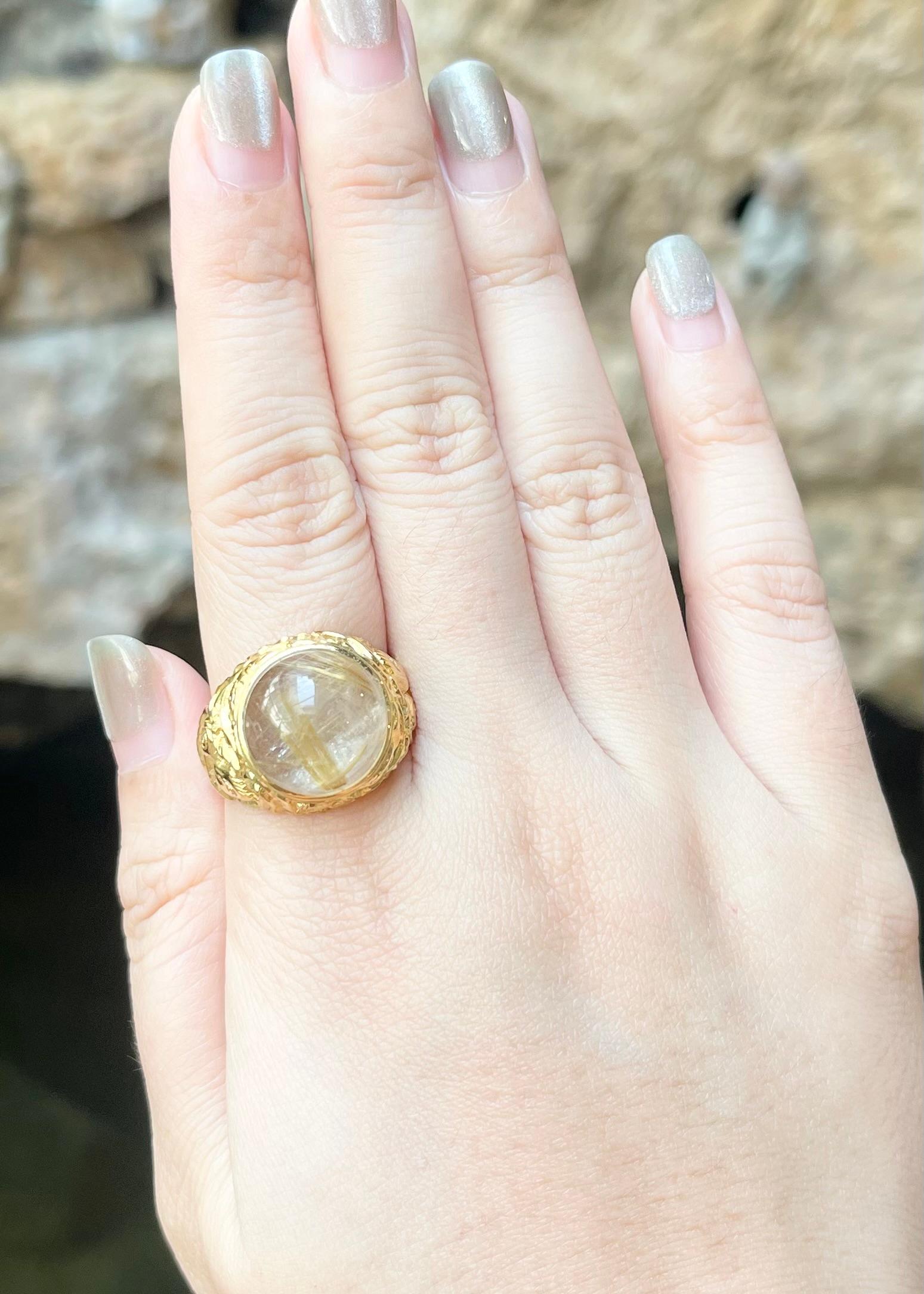 Rutilated Quartz 13.15 carats Ring set in 18K Gold Settings

Width:  2.0 cm 
Length: 2.0 cm
Ring Size: 68
Total Weight: 17.72 grams

