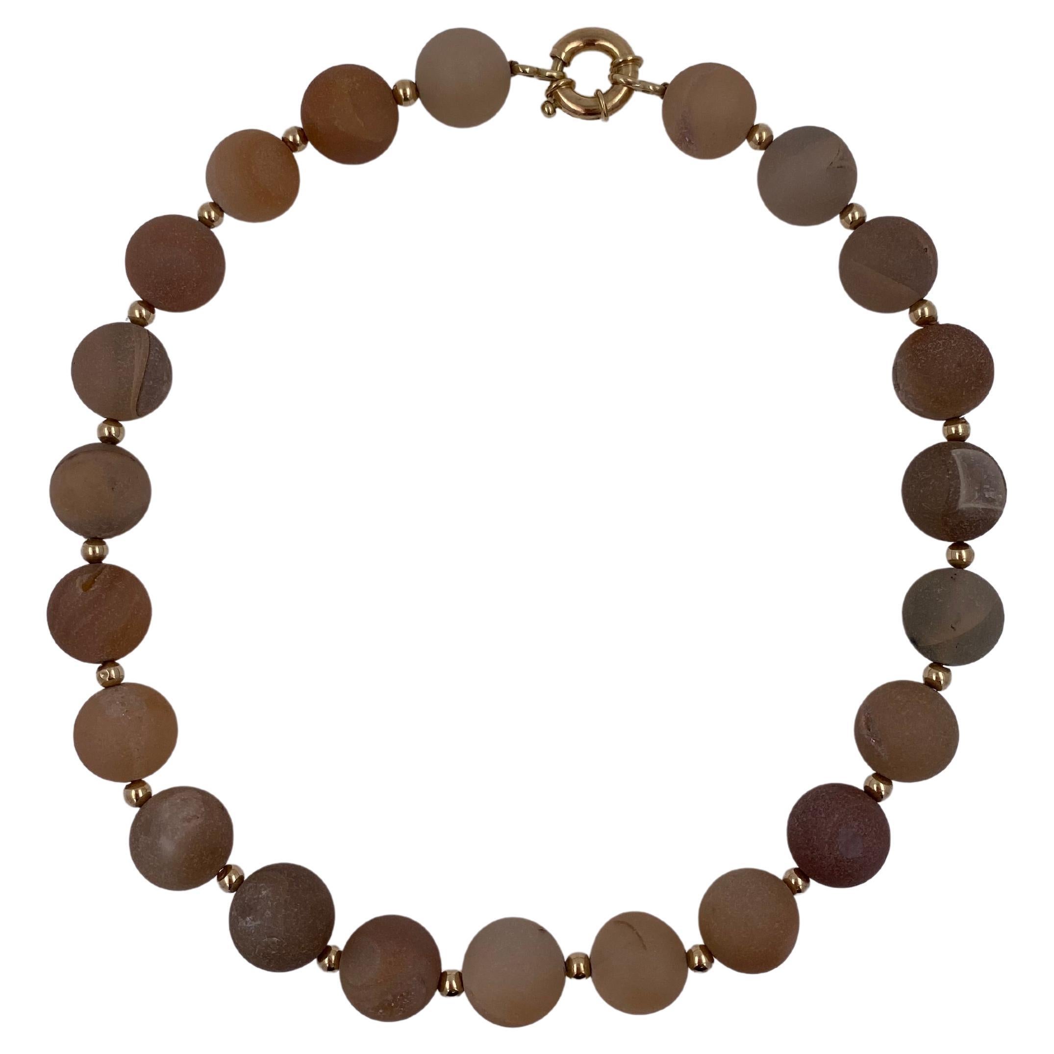 Natural Brown Pink Rutilated Quartz Round Circle Sphere Beads 14 Karat Yellow Gold Bead Short Pretty Versatile Gemstone Necklace
14 Karat Yellow Gold Beads + Solid Gold Clasp 
16.5 Inches Length 
Genuine Rutilated Quartz Round Circle Spheres
The