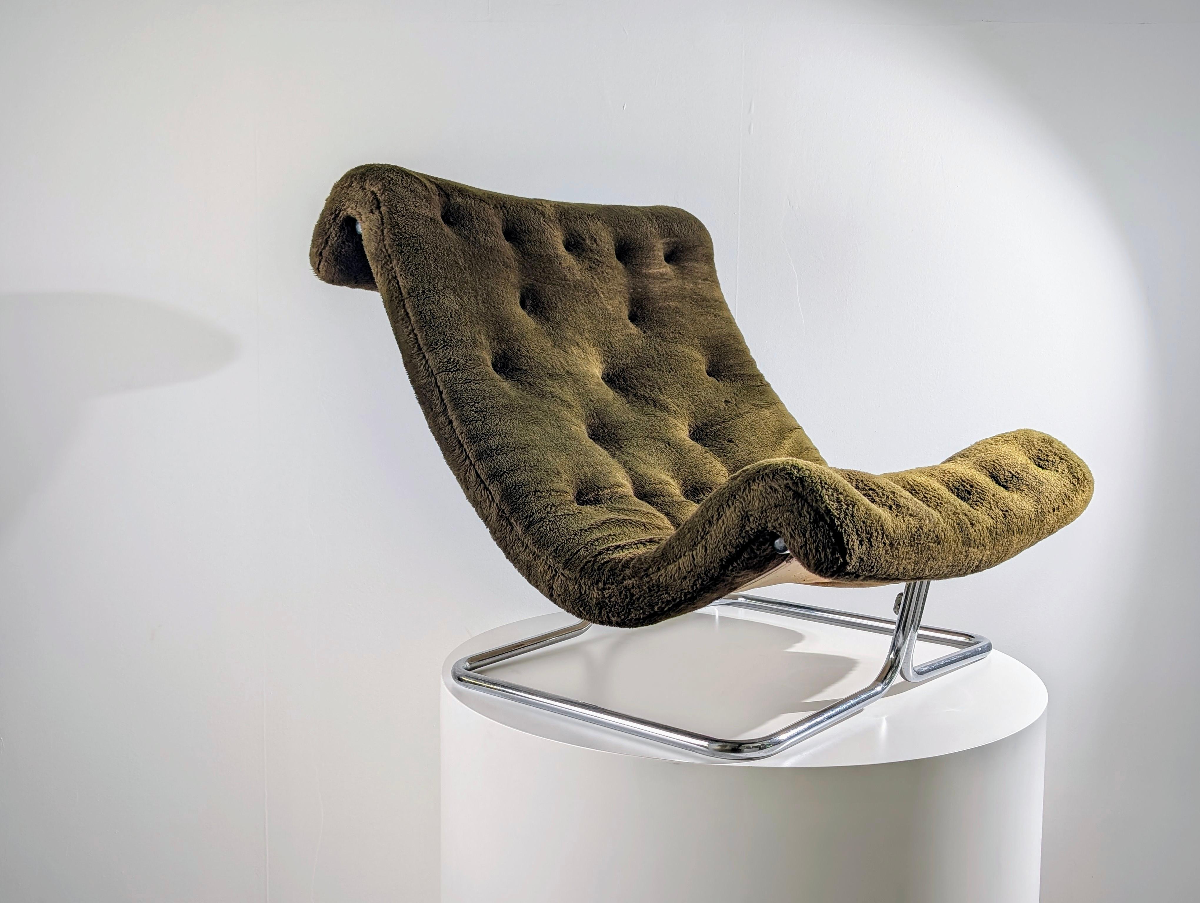 Sculptural lounge chair designed by Ruud Ekstrand and Christer Norman in Sweden during the 1970s, featuring a tubular chrome cantilever frame and a suspended seat with flowing, wave-like curves. The upholstery in an unusual moss green tone and plush