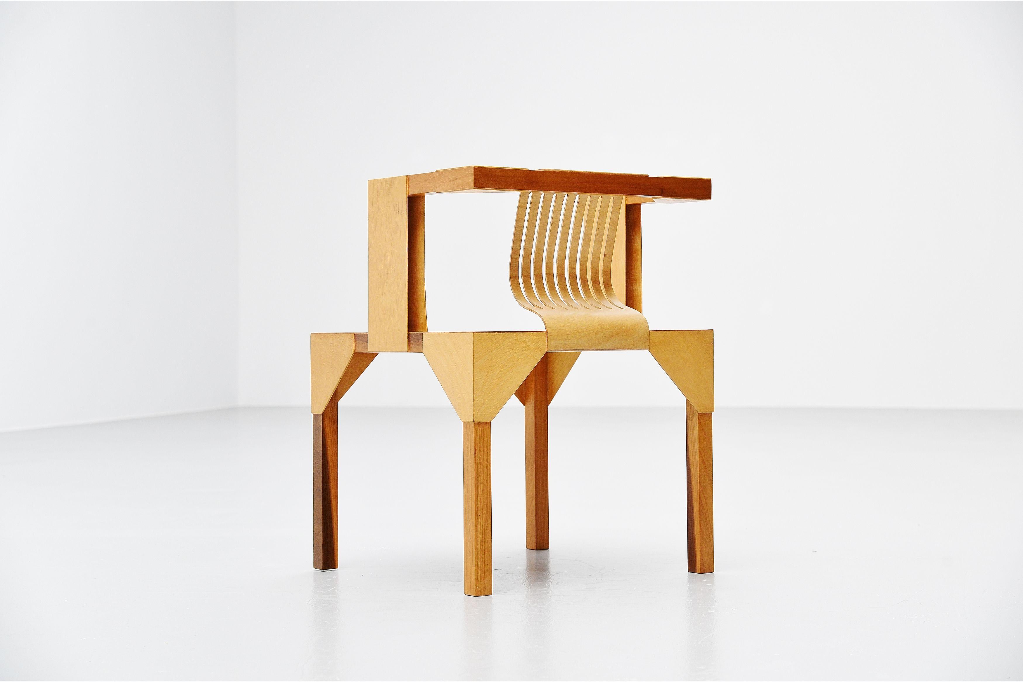 Very nice modernist slat chair designed by Ruud Jan Kokke, manufatured in his own atelier, Holland 1986. This chair is made of birch plywood and solid birch legs. It has a very nice woven seat and plywood back. Kokke was well know for its artistic