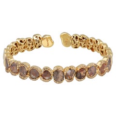 Ruwaya 18k yellow Gold bangle with Brown Sapphires and Round Cut Diamonds
