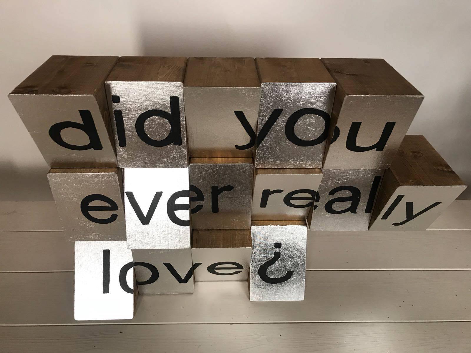 Hope Hope the only good for the afflicted mortals

This is a Conceptual Contemporary art piece, made up of Wooden Blocks, Acrylic Paint Silver Leaf on Canvas. The Artist asks, have you really ever truly loved? Ask yourself. 

This was a major