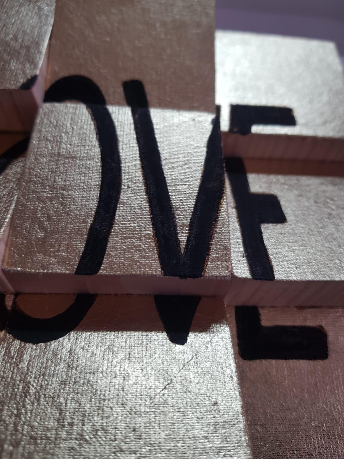 Love is an Original, Conceptual, Contemporary Art Piece.  Acrylic Paint on Canvas applied onto Wooden Blocks Personally Signed. 
Each block is then painted with acrylic paint on Acrylic Paint on Cotton Paper. If miscalculated at any point of the