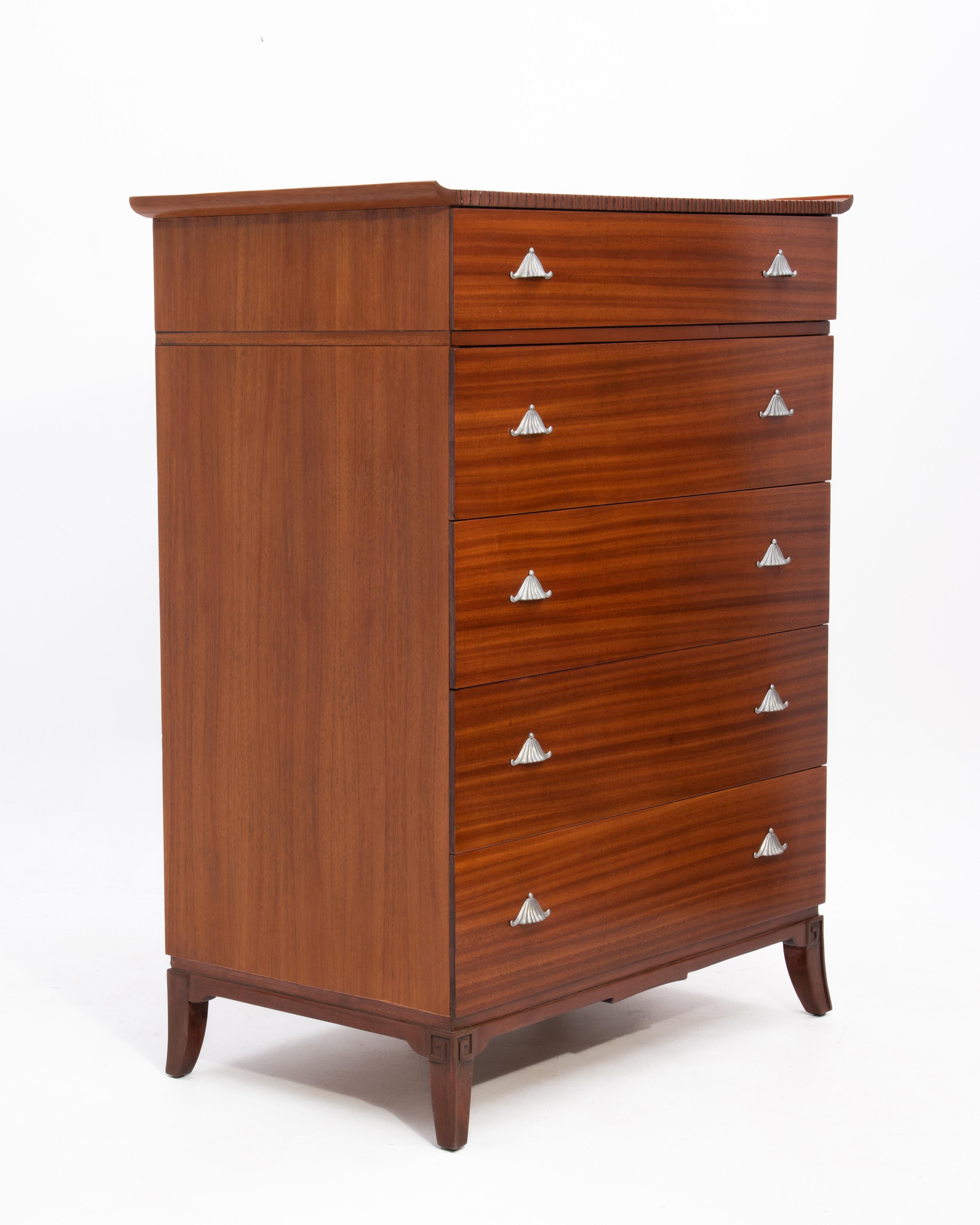An absolutely stunning RWAY Mid Century dresser in the style of James Mont. Extremely well made with excellent wood selection, great proportion and graduated drawers.