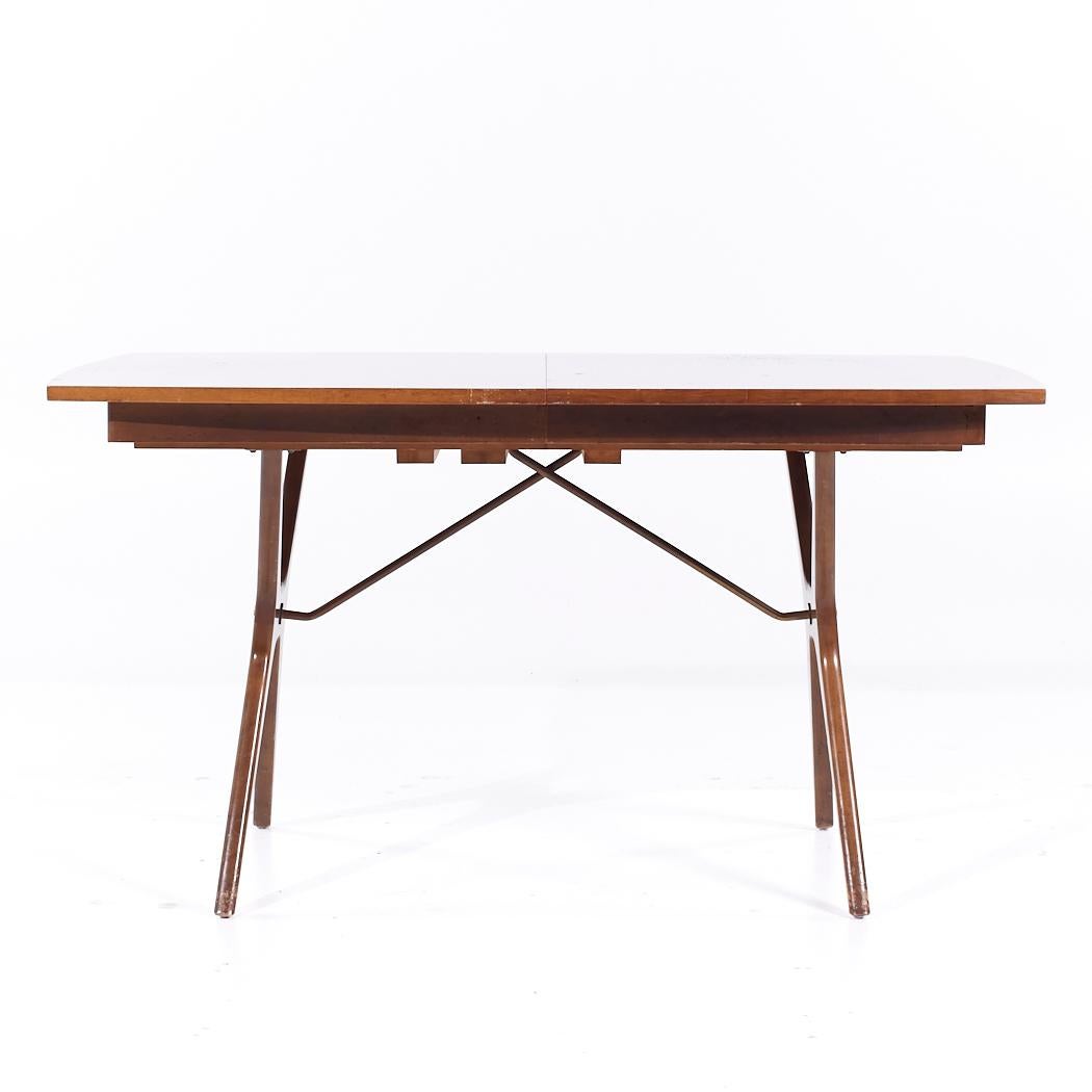 Rway Mid Century Walnut and Brass Expanding Dining Table with 2 Leaves

This table measures: 54 wide x 36 deep x 29.25 inches high, with a chair clearance of 26 inches, each leaf measures 16 inches wide, making a maximum table width of 86 inches