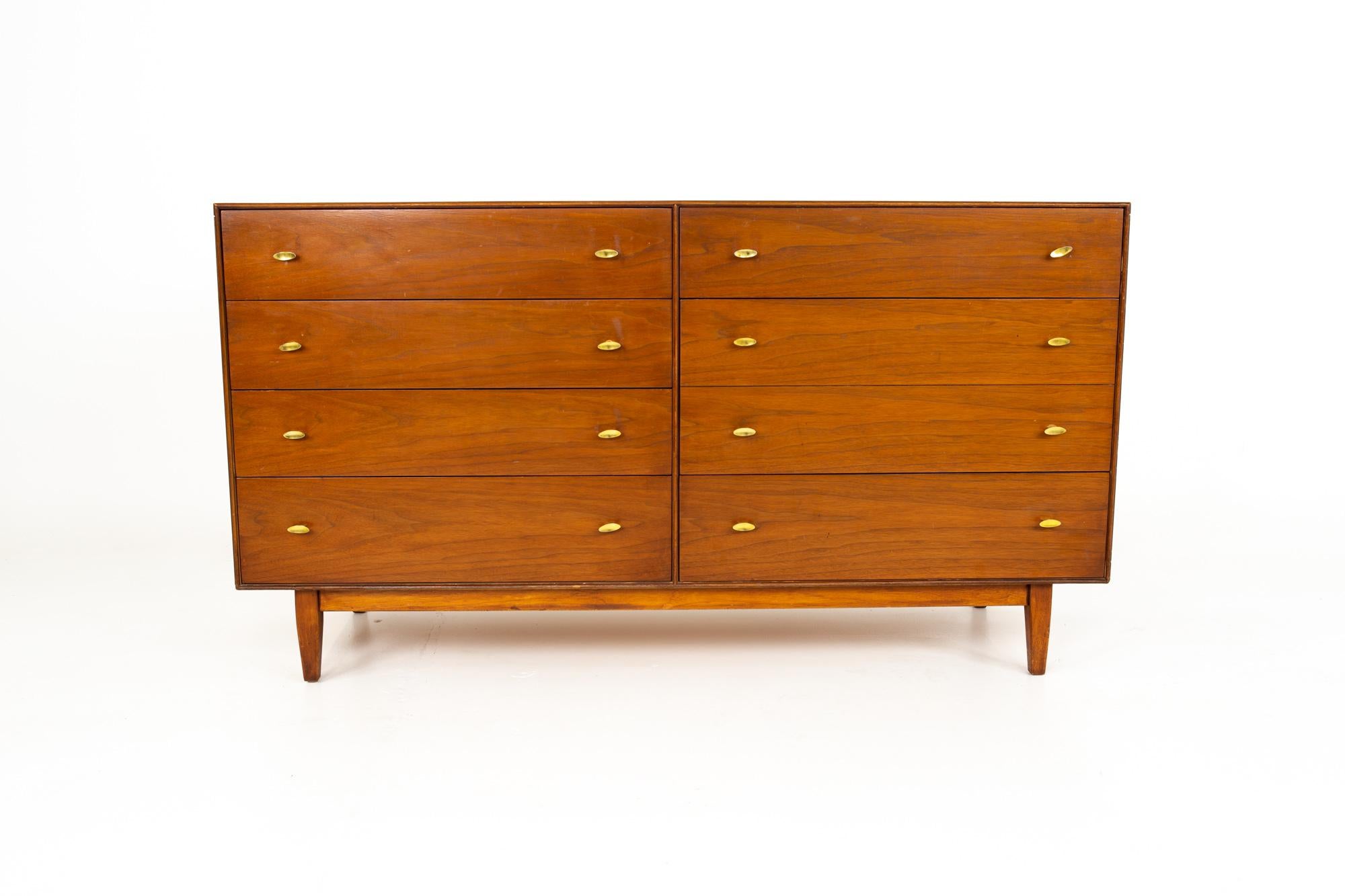 RWAY Mid Century walnut and brass 8-drawer lowboy dresser
Dresser measures: 55.75 wide x 18.5 deep x 30.75 high

This price includes getting this piece in what we call restored vintage condition. That means the piece is permanently fixed upon