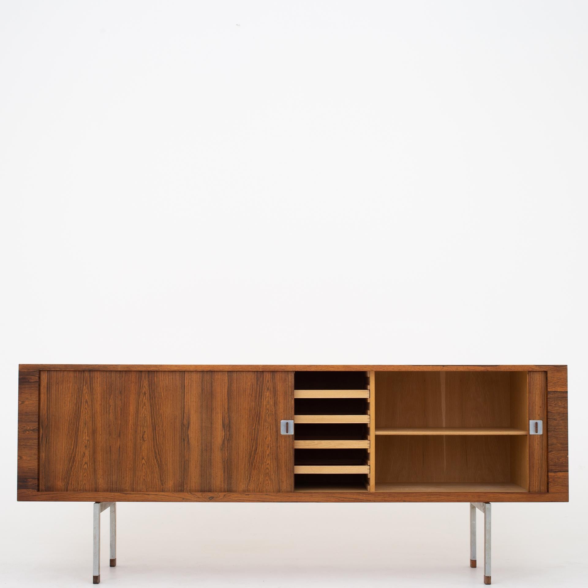 RY 25 - Sideboard in rosewood with legs of steel and shoes of rosewood. Maker RY møbler.