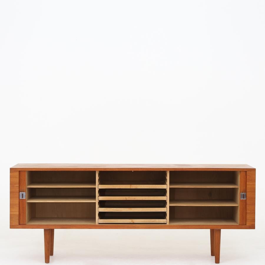 RY 25 - Sideboard in teak with tambour doors on wooden legs. Designed in the 1950s. Maker Ry Møbler.