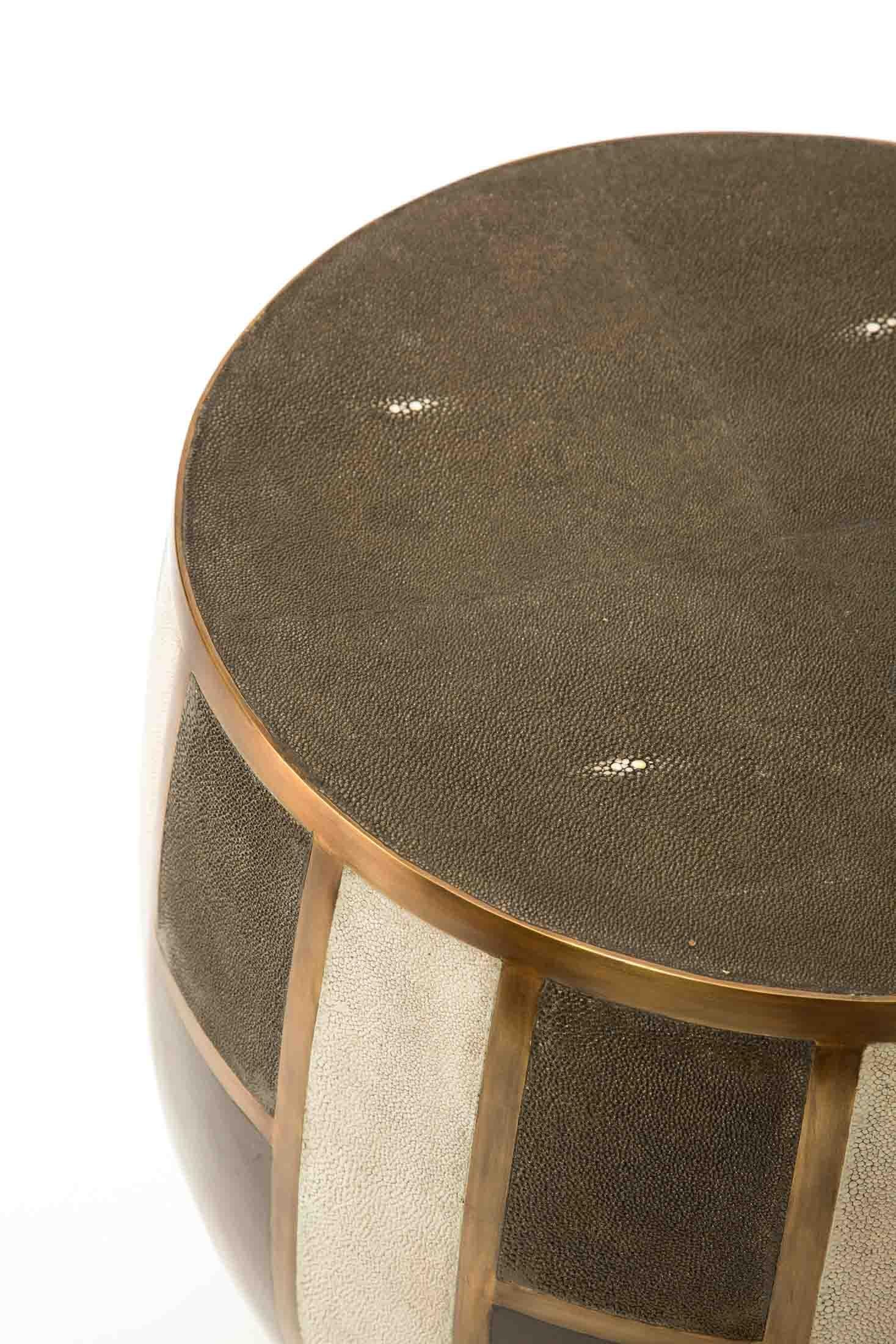The Tartan stool brings a touch of pattern in your space. A perfect harmony between different exotic materials that are signature to the style of R & Y Augousti. The sleek brass edge makes for an elegant touch. Available in two different variations: