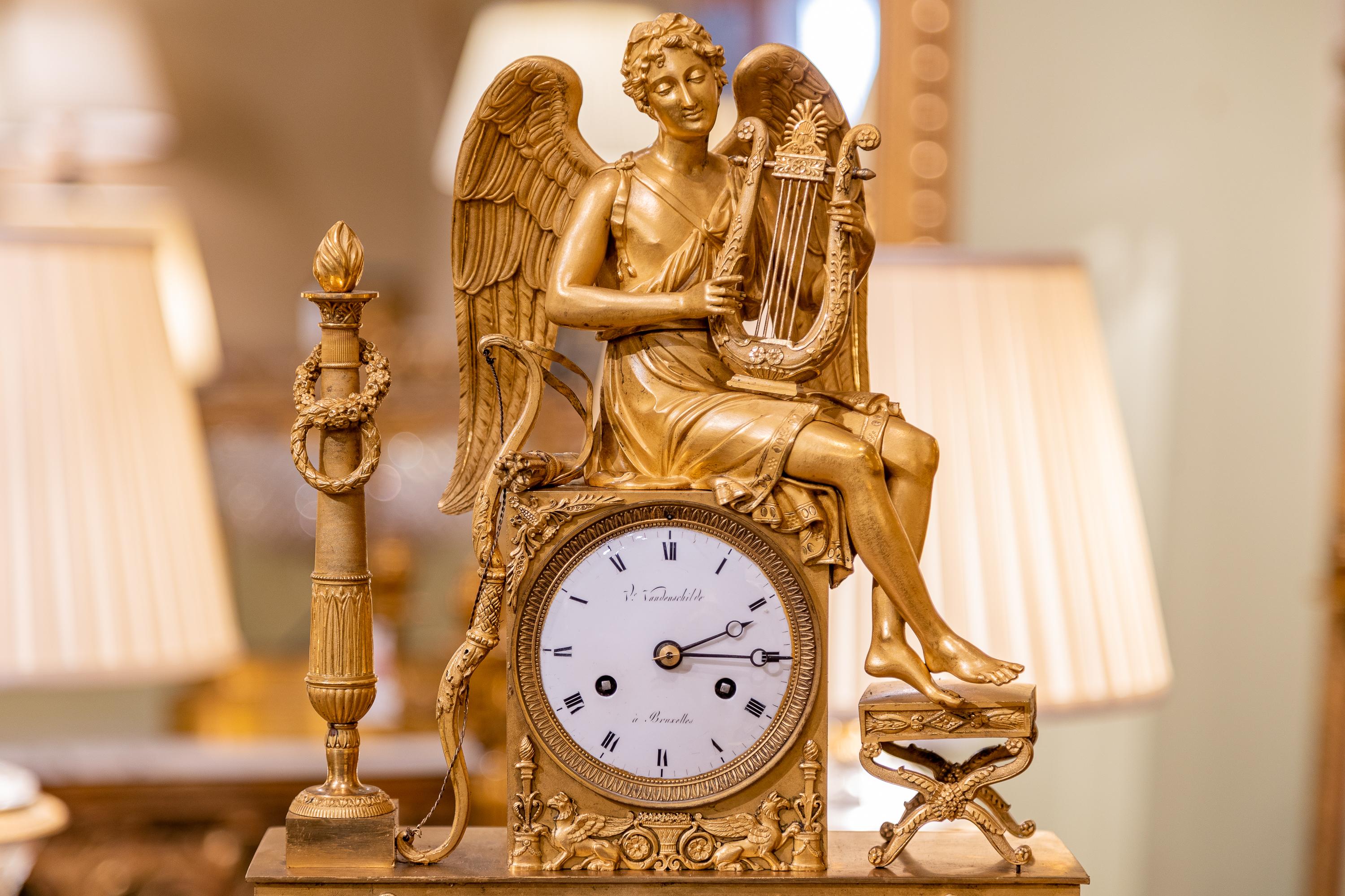 A very fine and rare late 18th century French mercury gilt bronze Empire clock. Signed V Vandenchildes a Brussels.
