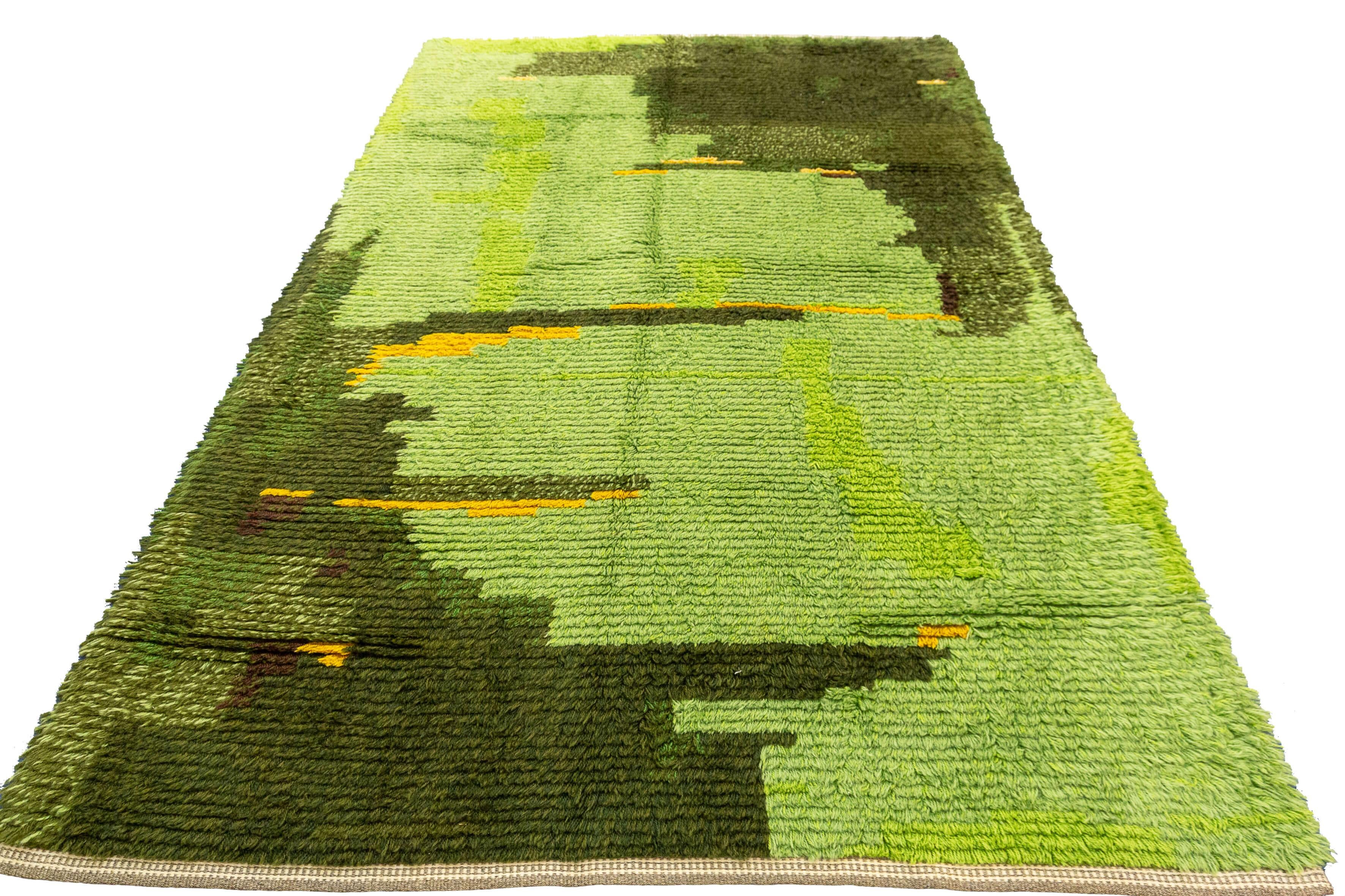 This Rya Swedish rug is adorned with a beautiful green color that exudes freshness, tranquility, and a connection to nature. The lush green hue adds a vibrant and rejuvenating touch to any space it graces, infusing it with a sense of serenity and