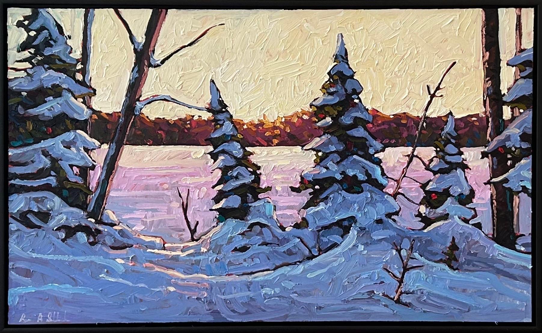 This winter landscape captures the sun setting on the shores of Lake Superior in the winter. Snow covered trees glow in the golden rays of the day's last light, creating a warmth that isn't always found in winter landscapes. This is the perfect