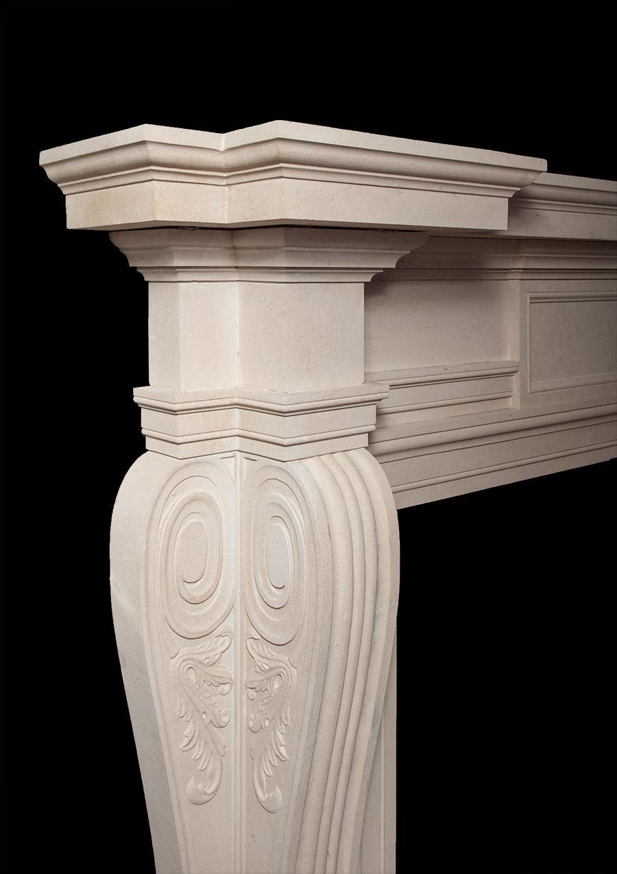 Hand carved from solid blocks of English Portland stone. The front and side consoles have carved acanthus leaf decoration. The wide framed in-grounds, architrave and cornice mouldings are all of solid mid-18th century Palladian design.

 