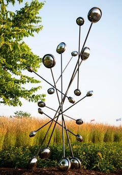 Used Looking - tall, geometric abstract, powder coated outdoor steel sculpture