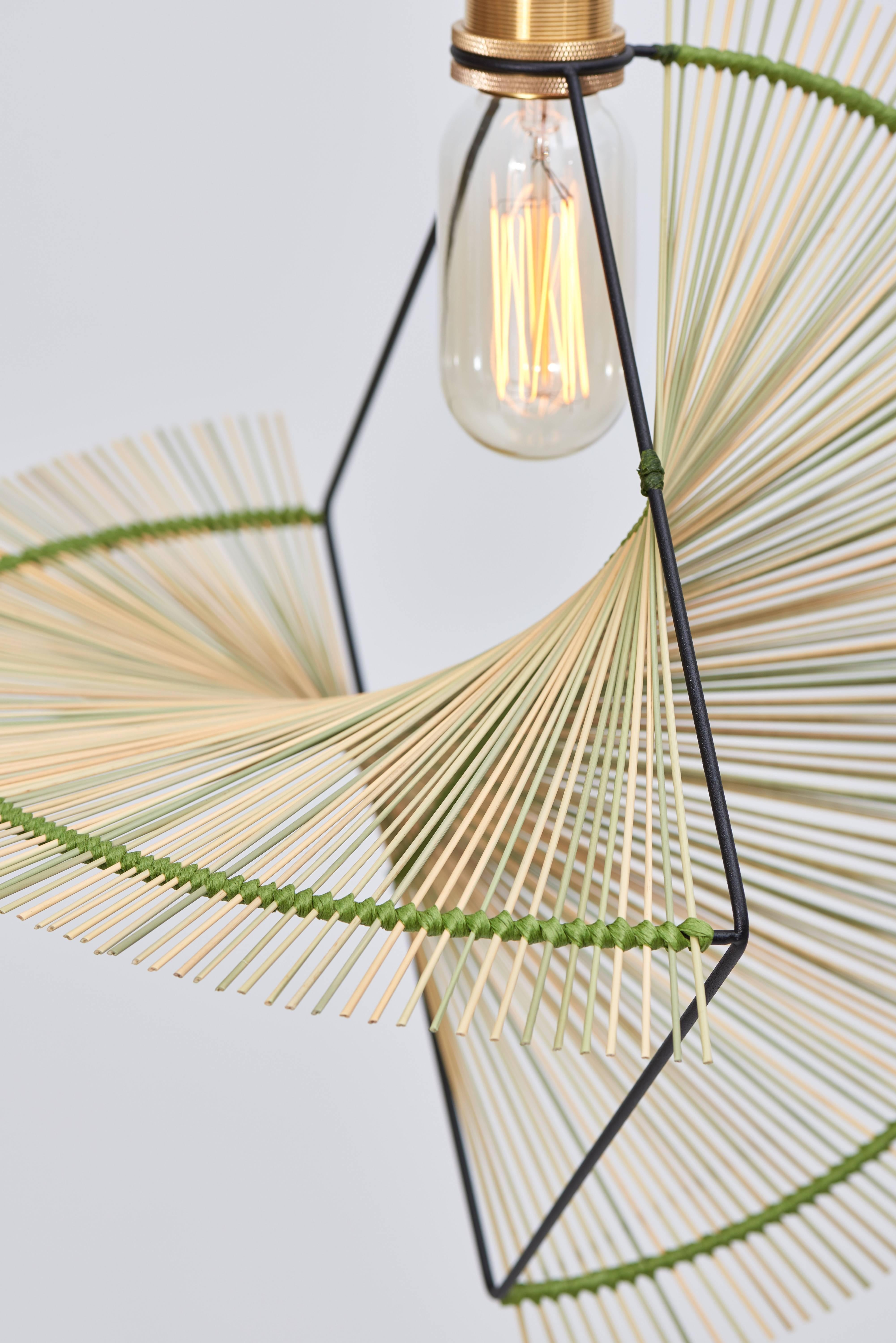 Ryar light
Umbrella sedge,
Powder coated steel
Measures: 60 x 58 x 58 cm
Light bulb included, E27 40W 220V.
Supplied with 250cm black fabric cable.
Wall fixings not included.

Ryar means ocean in the Pangcah language, this is a pendant light