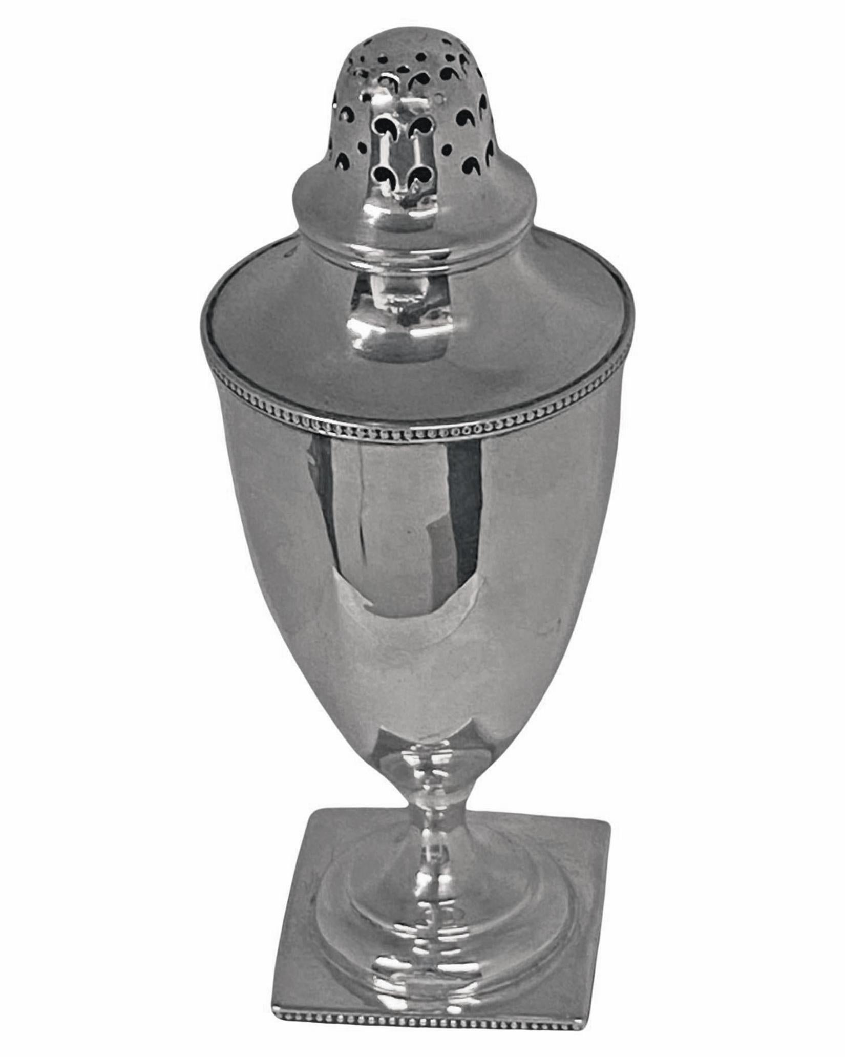 Ryrie Sterling silver Caster, C.1900. Georgian style, vase shaped on square pedestal foot with bead surround. The body plain with monogram possibly G or C to one side, detachable pierced cover. Full Ryrie Sterling hallmarks to underside and stamped