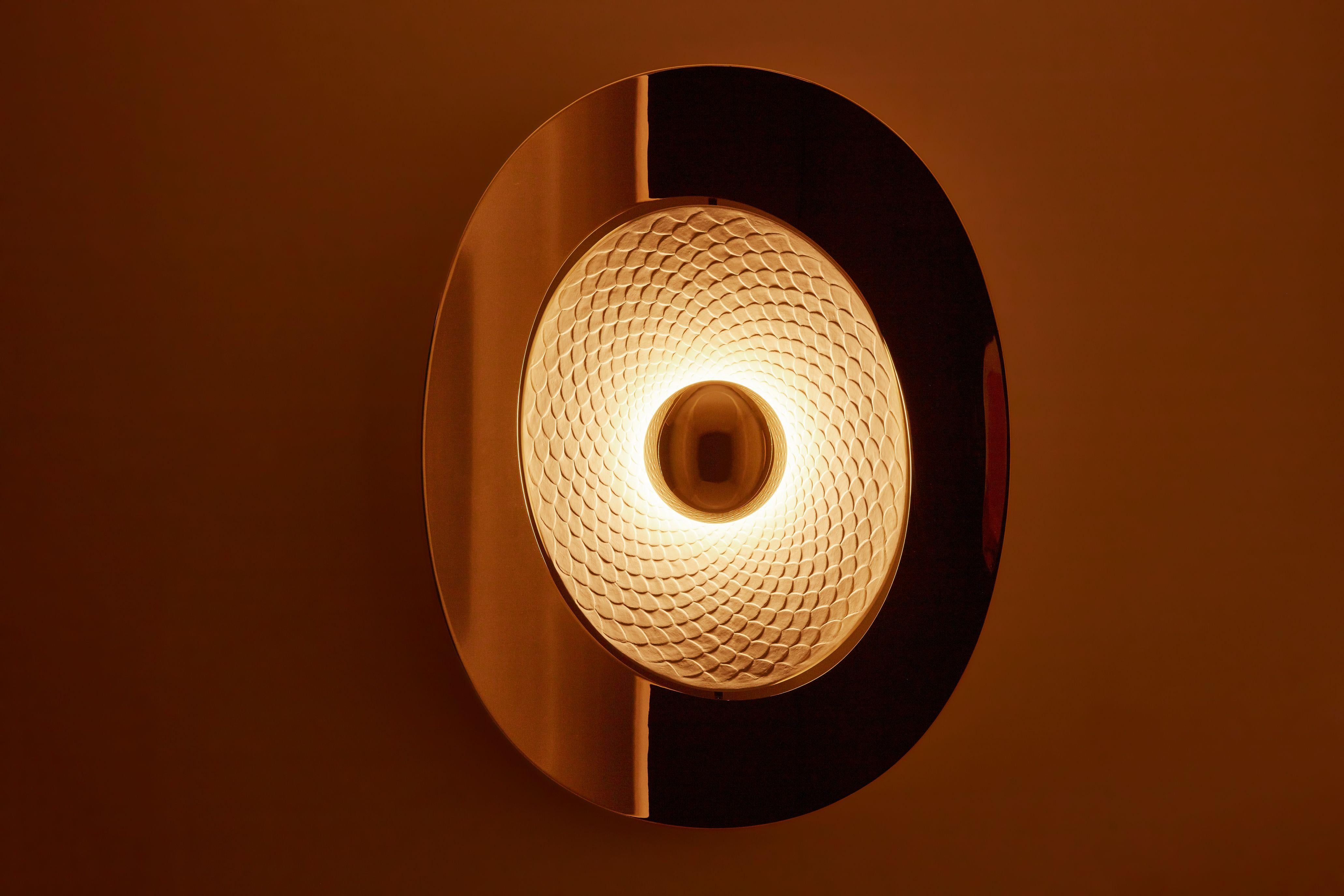 Ryu wall lamp by MYDRIAZ
Dimensions: W 53.4 x H 65.3 x D 8 cm
Materials: Brass, plaster
Finishes: Golden-plated, polished brass, white nickel finish, on polished brass, black nickel finish on
polished brass

All our lamps can be wired