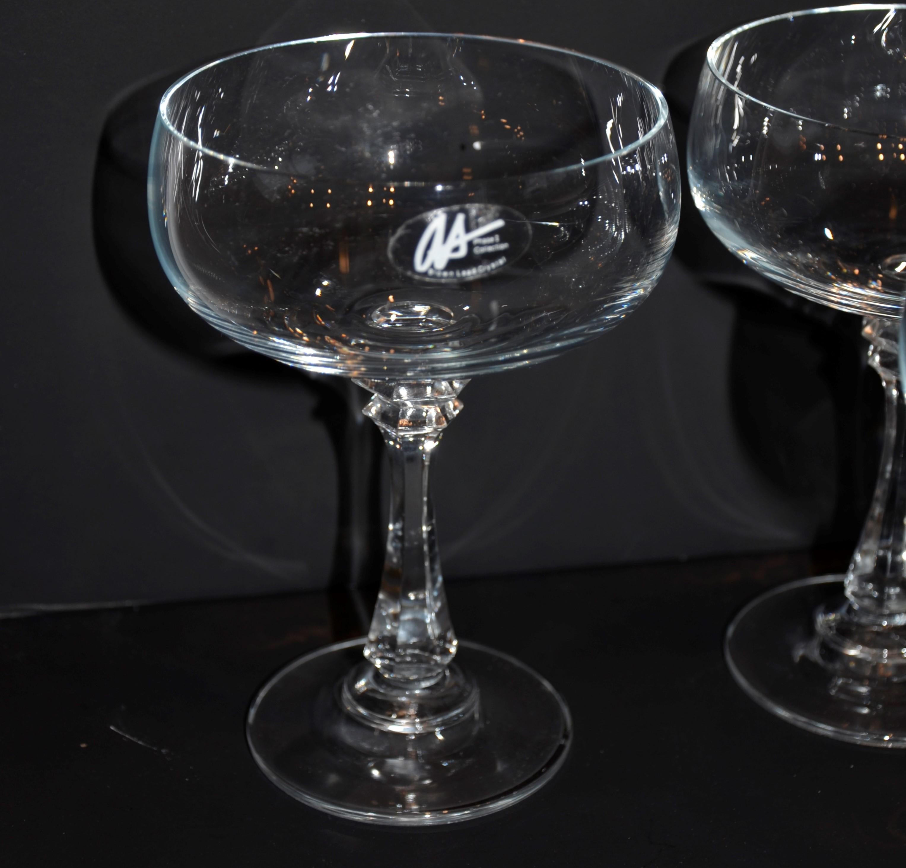Offered is a set of 12 Mid-Century Modern signed 