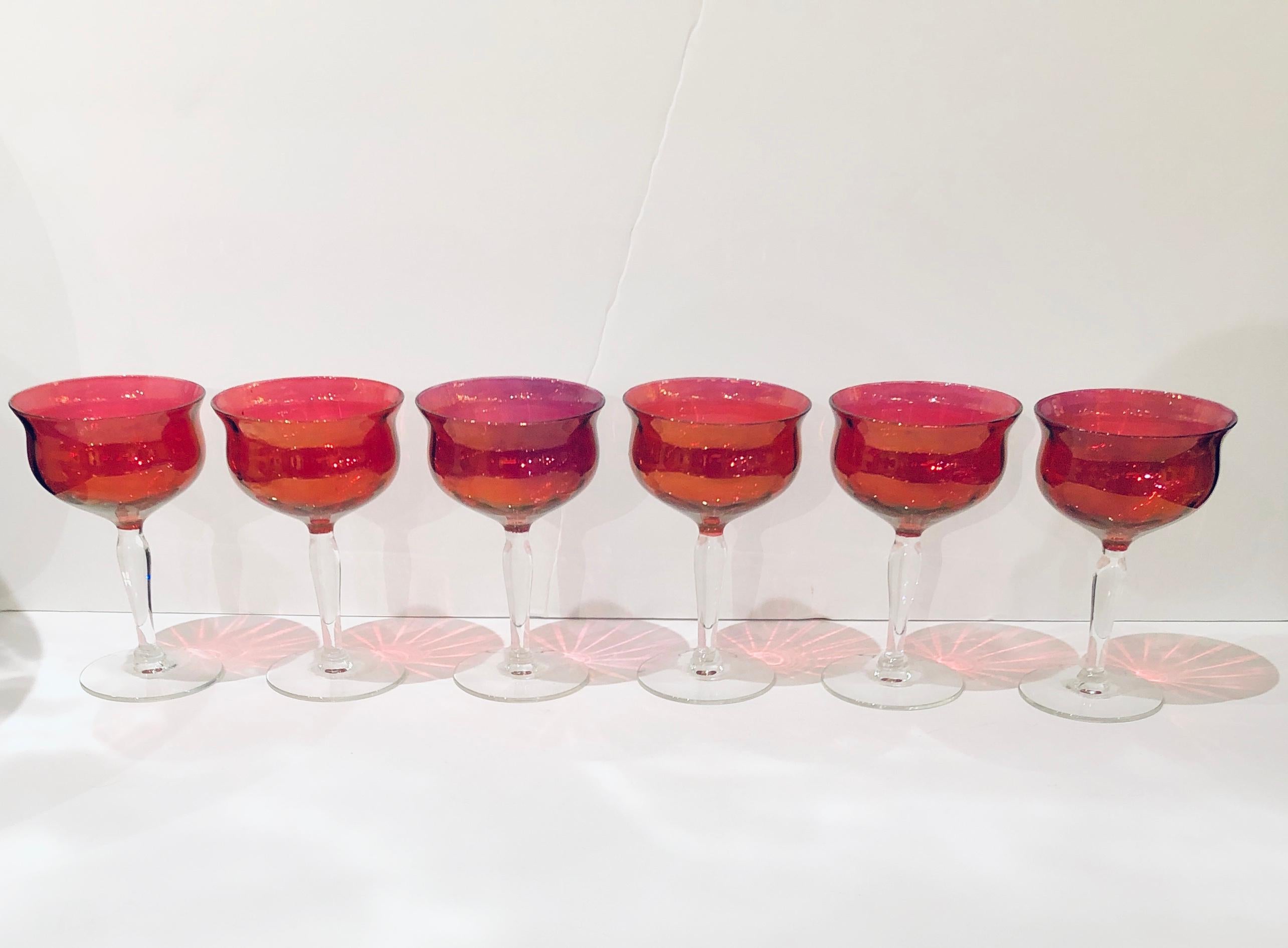 Offered is a set of six ruby red with clear stem vintage French crystal champagne coupes' glasses / barware bringing to mind props worthy for golden age movies such as 