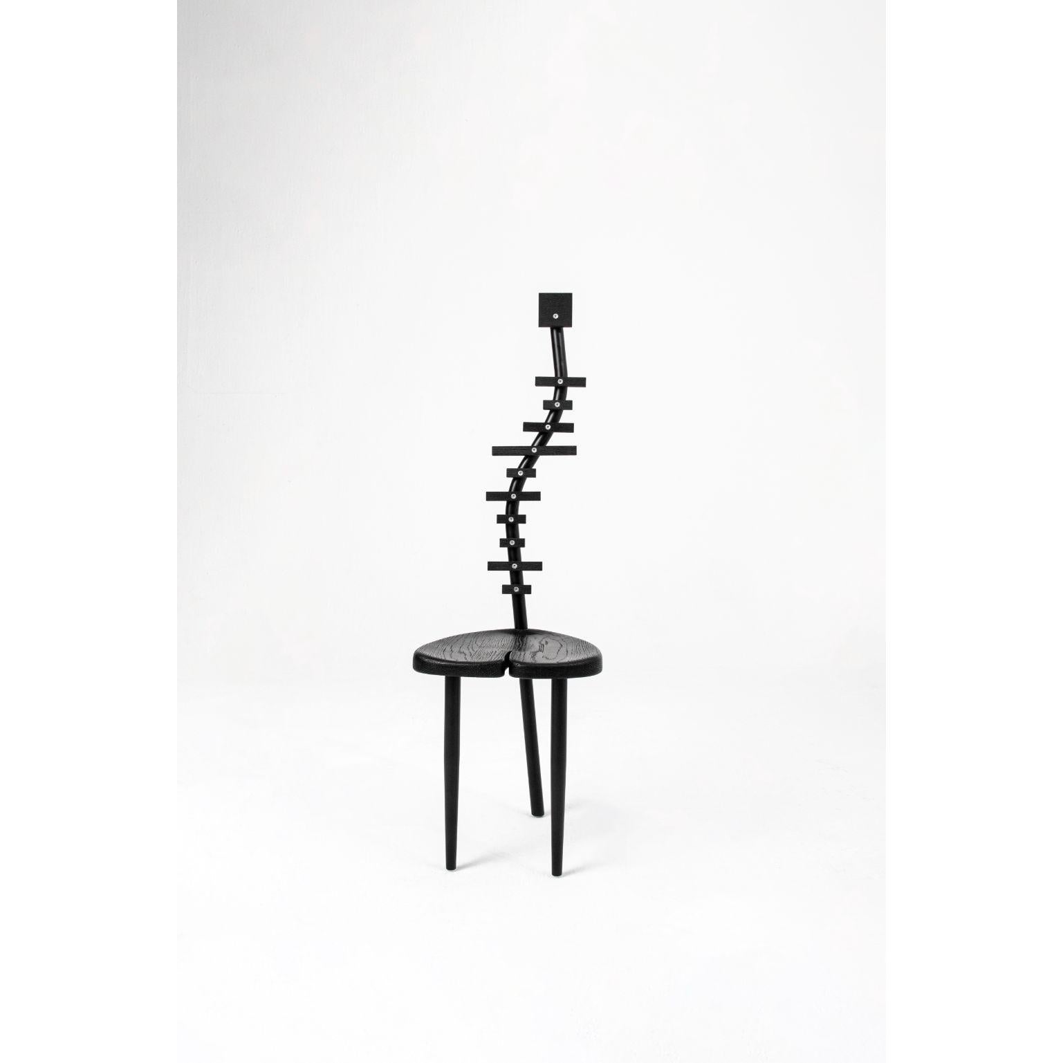 S-70 by Studiofer
Materials: Oak wood, metal
Dimensions: W 38, D 43.5, H 126 cm

S-70 is an artistic piece that embodies anatomical similarities that represent scoliosis. The S-70 lays foundation of 2 worlds coming together, the natural and