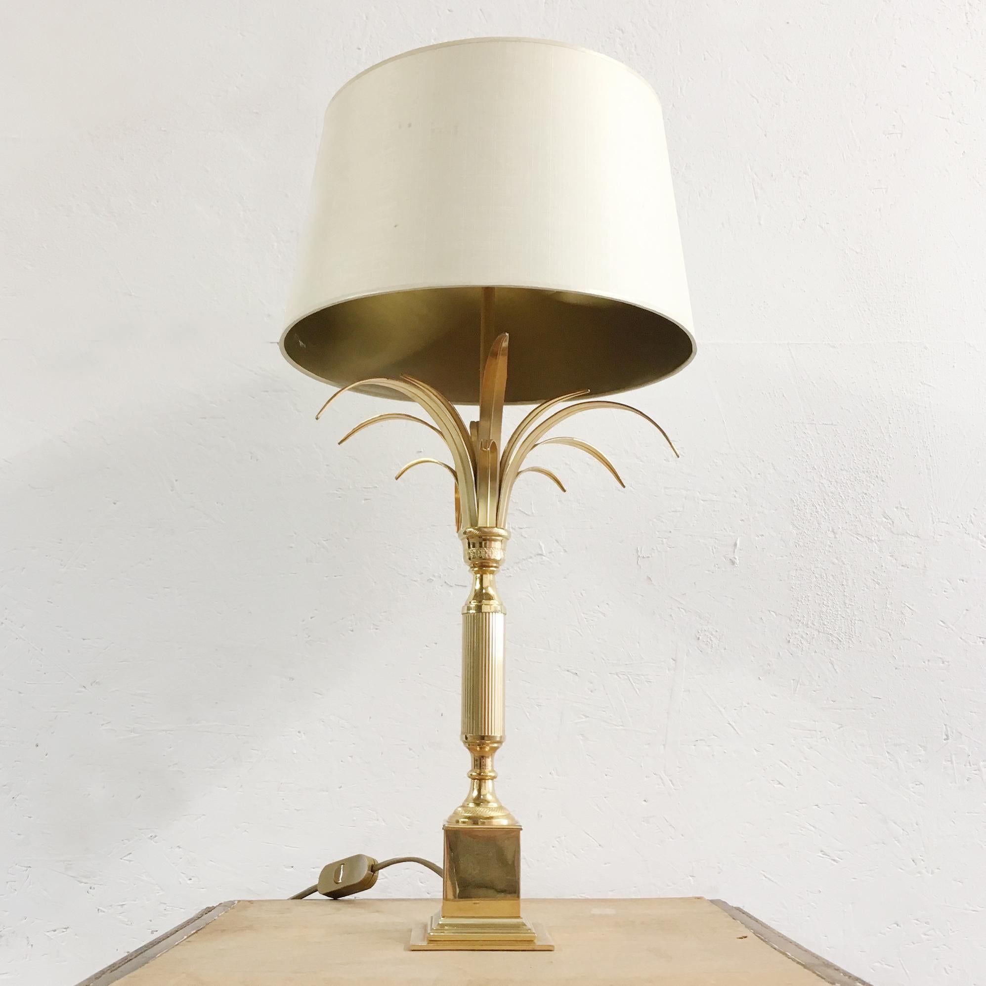 S A Boulanger large reed lamp, pineapple fronds
1960s-1970s
Brass
Made by S A Boulanger, Belgium
Two E14 Bulbs, 60 Watt max

Measures: 
Height 65cm
Fronds width 27cm
Base 9 x 9 cm
Shade 30cm Width

Shade is original to the lamp and has