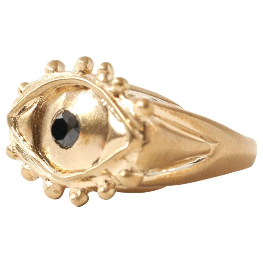 Eyes Open. Cape on.

This special edition eye ring is made in collaboration with artist-run collective, Wide Awakes. Mati is a hand-carved oval signet shaped ring featuring angled grooves on all sides and beaded metal accents. The 'pupil’ is either