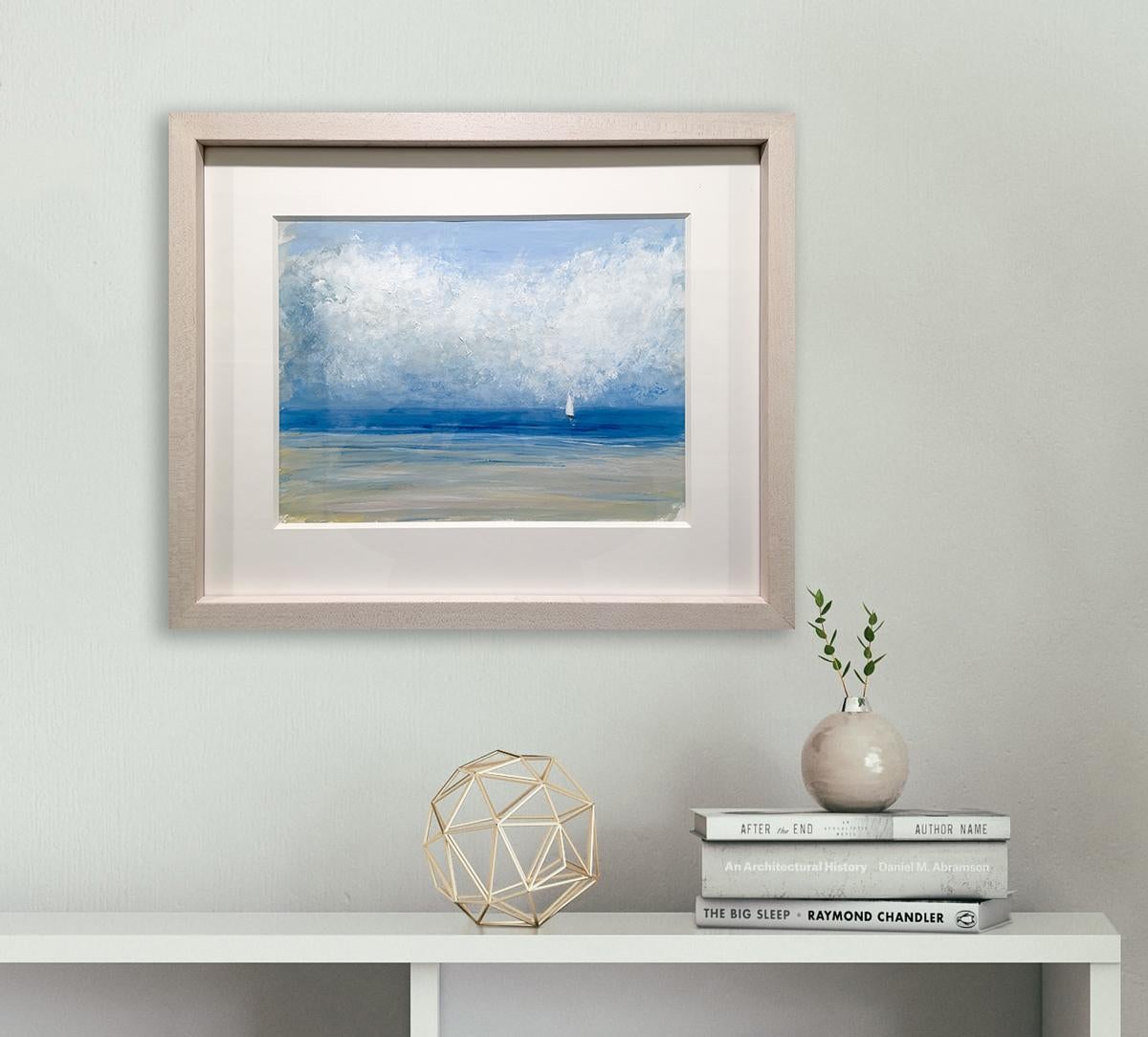 This contemporary seascape painting by S.C. Aldo is made with acrylic paint on Arches paper. It depicts a lightly abstracted coastal scene with a light blue sky, and white abstracted clouds and a small sailboat with a white sail floating off a sandy