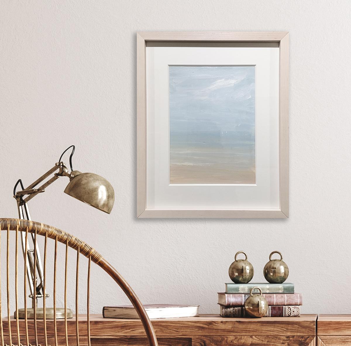 This contemporary seascape painting by S.C. Aldo is made with acrylic paint on Arches paper. It features a light, almost pastel coastal palette, and captures an abstracted view of the ocean and shoreline in the foreground, and two small white
