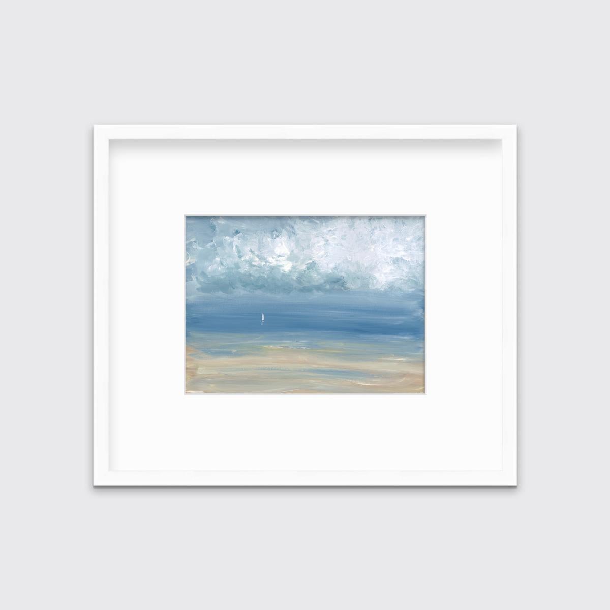 This contemporary seascape limited edition print by S.C. Aldo depicts a loose, abstracted coastal scene with a light blue sky, textured abstract clouds and a small white sailboat sailing near the horizon. A sandy shoreline blends into the water with