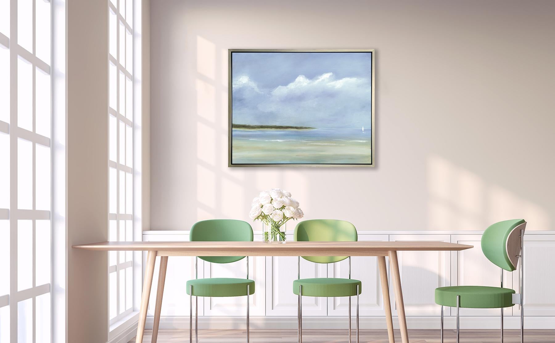 This limited edition seascape print by S.C. Aldo captures a coastal scene overlooking water from a sandy shore, with green trees lining part of the horizon and a sailboat sailing in the distance. Aldo's signature style borders on Impressionistic,