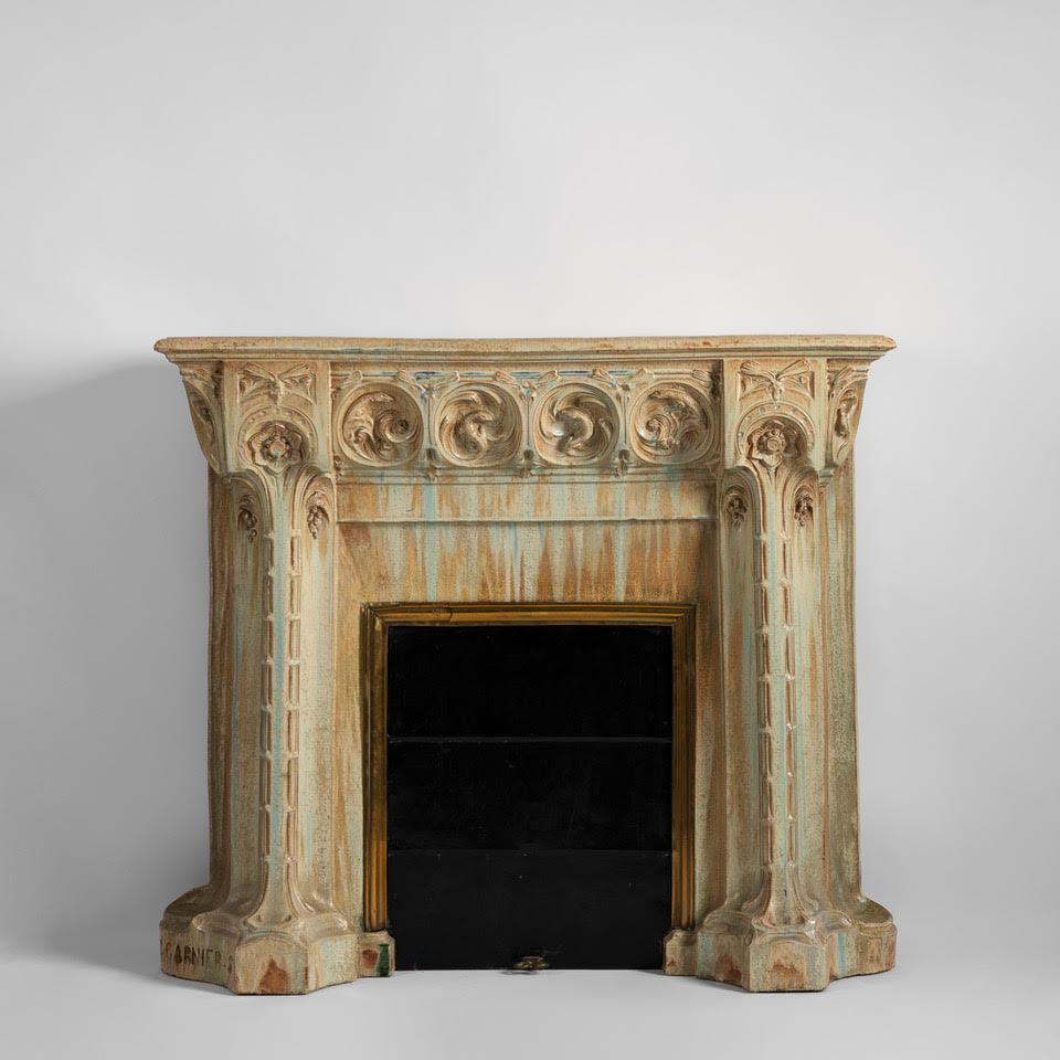 Antique monobloc Art Nouveau style enameled stoneware mantel decorated with salamanders and stylized flowers, circa 1900.

Alexandre Bigot (1862-1927) created the company Bigot, a ceramic manufacturing plant specializing in flamed stoneware in Mer